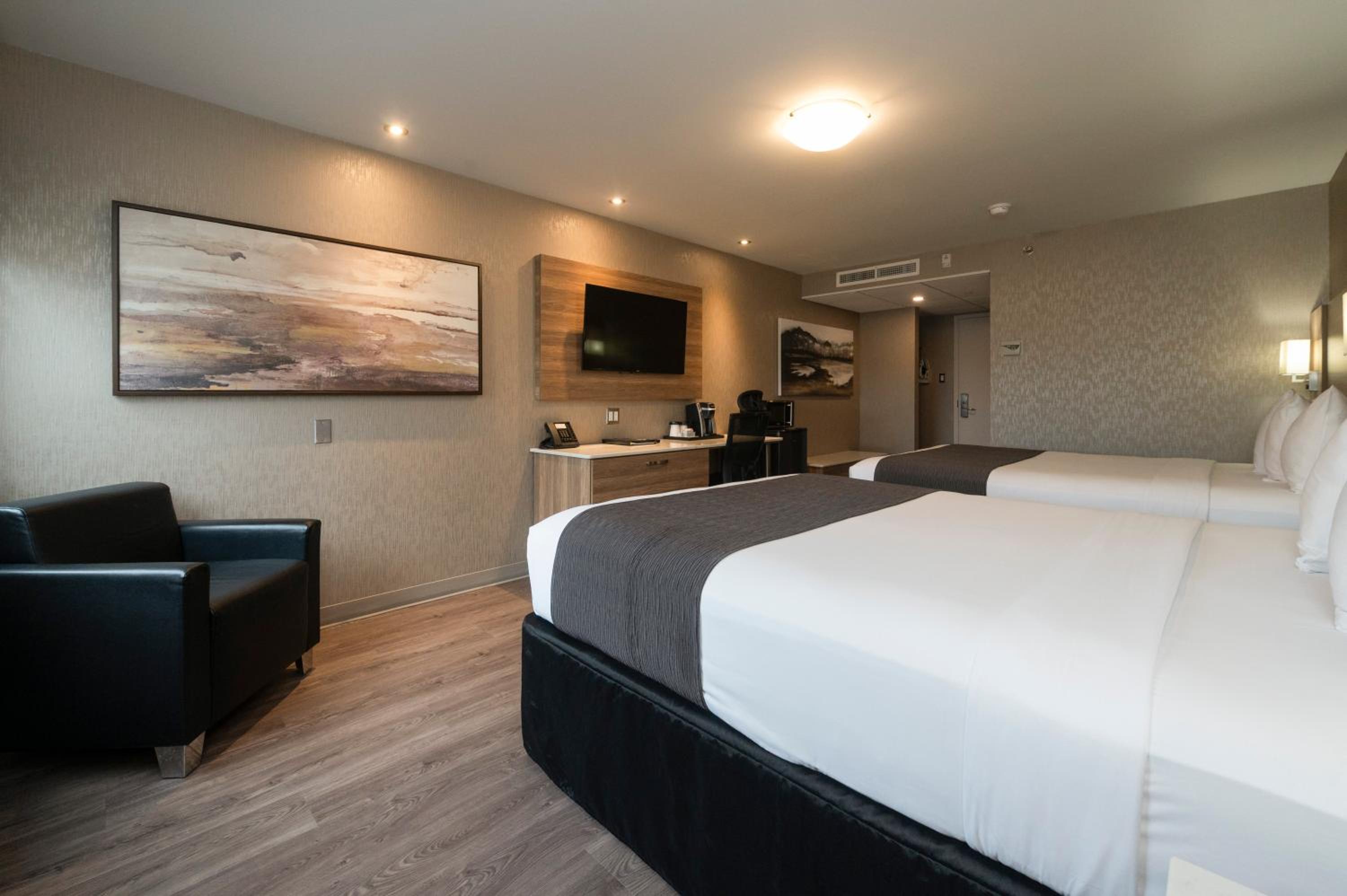 Queen Room with Two Queen Beds - Photo 1