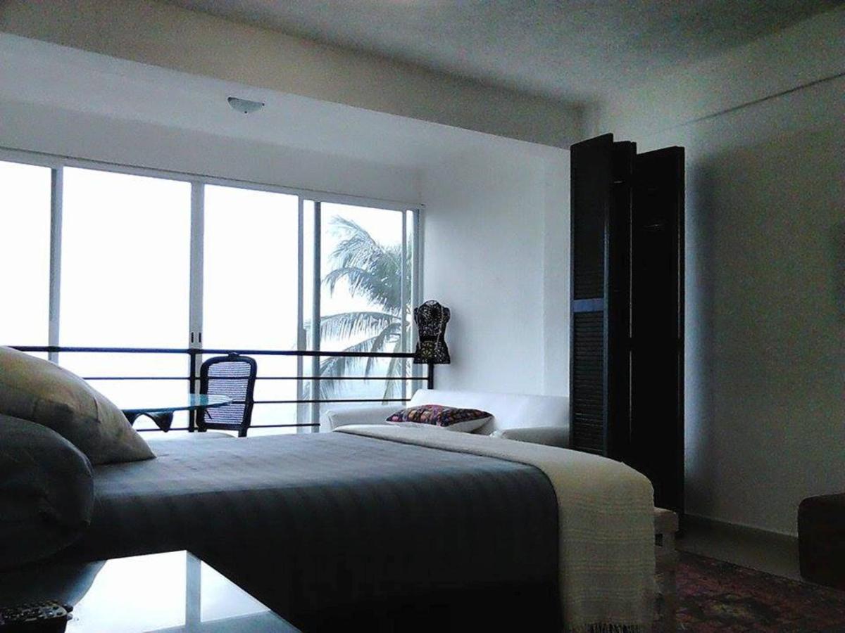 Double Room with Two Double Beds with Private Bathroom - Sea View photo 1