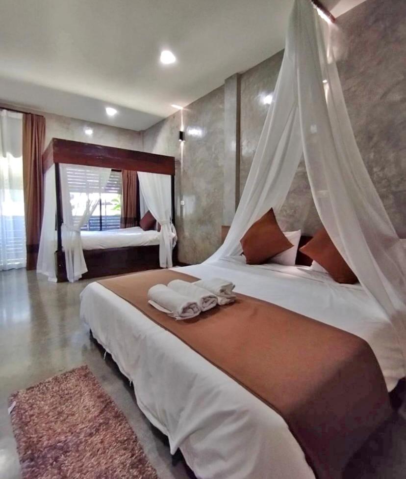 Deluxe Triple Room - Photo 1