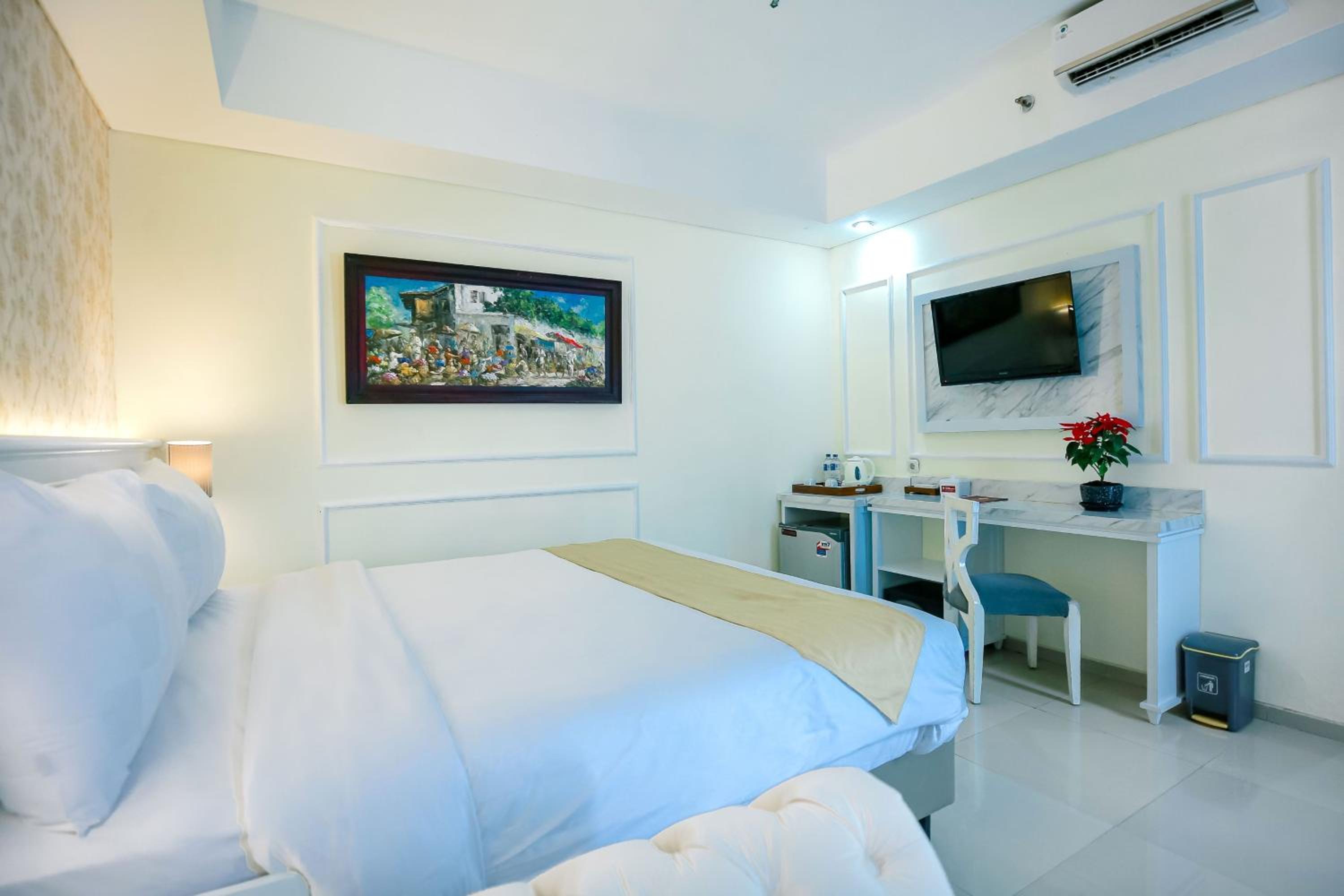Deluxe Room - Photo 12