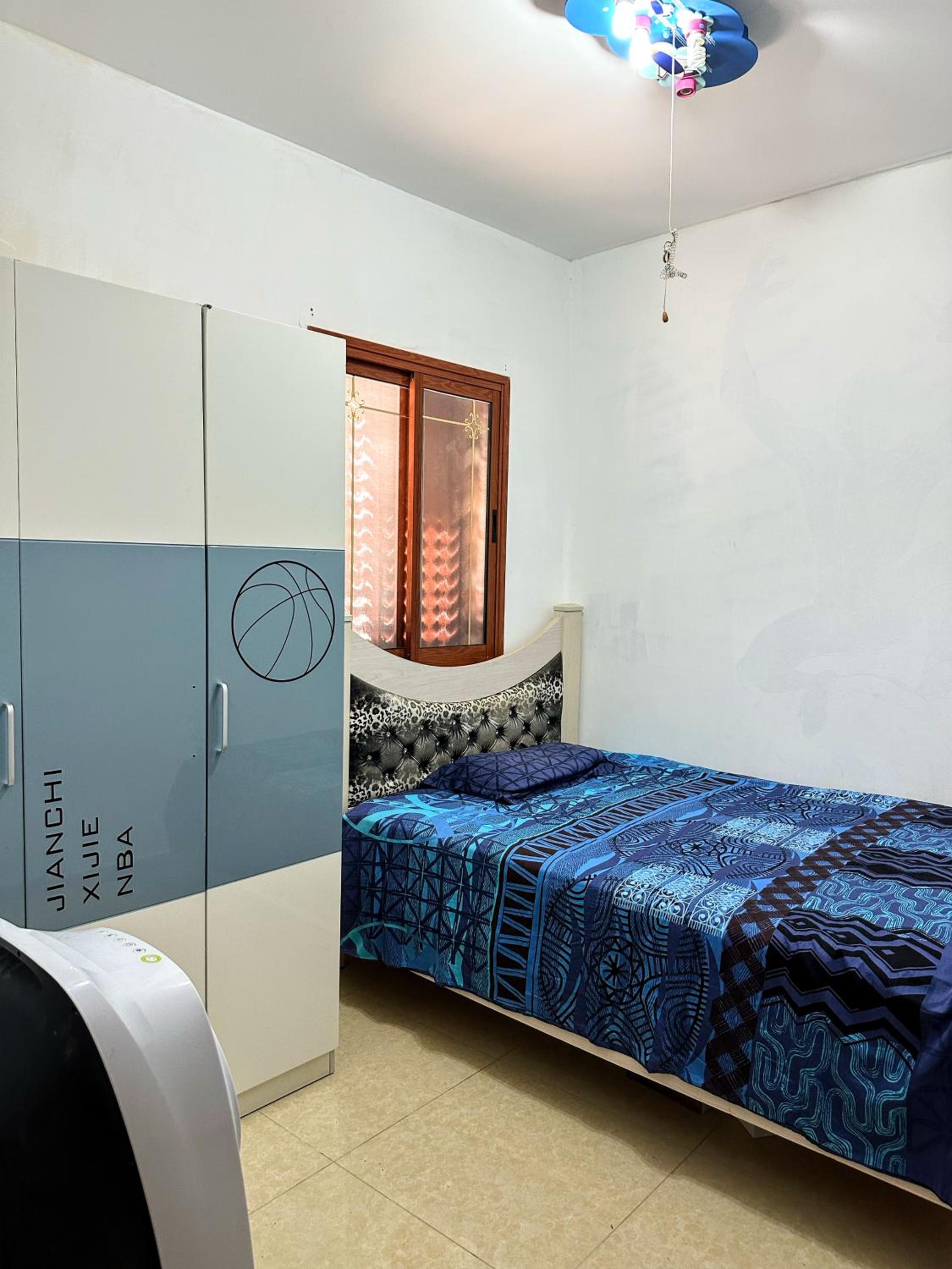 Three-Bedroom Apartment photo 1
