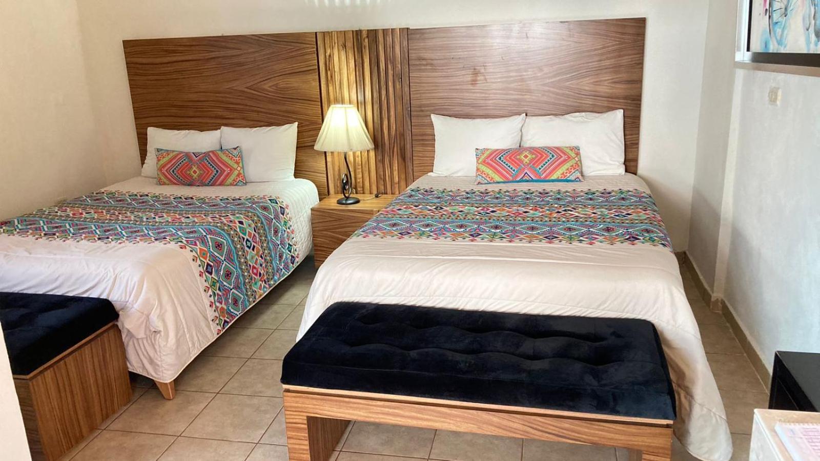 Standard Queen Room with Two Queen Beds photo 1