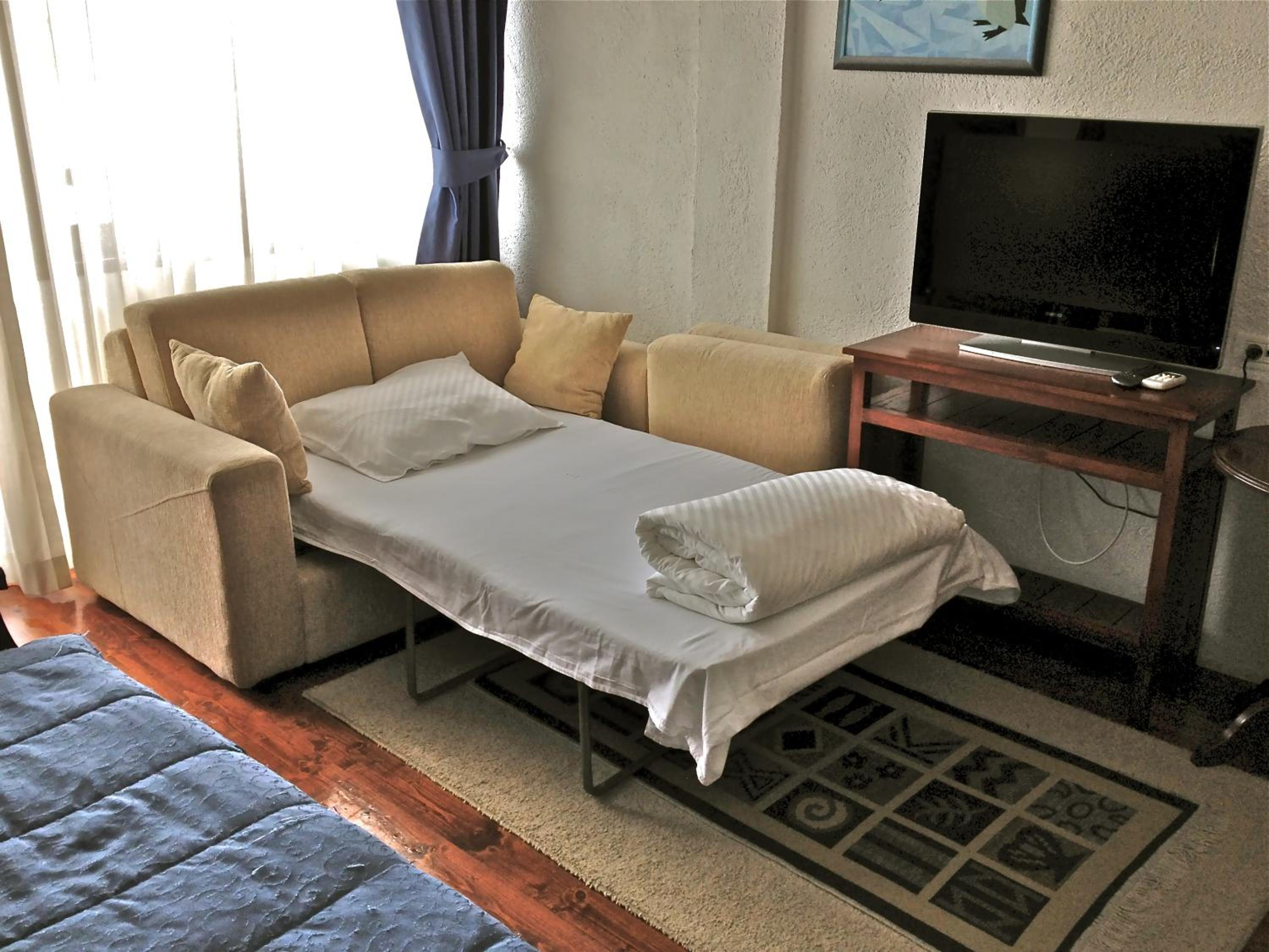 Double Room with Extra Bed and Balcony - Photo 11