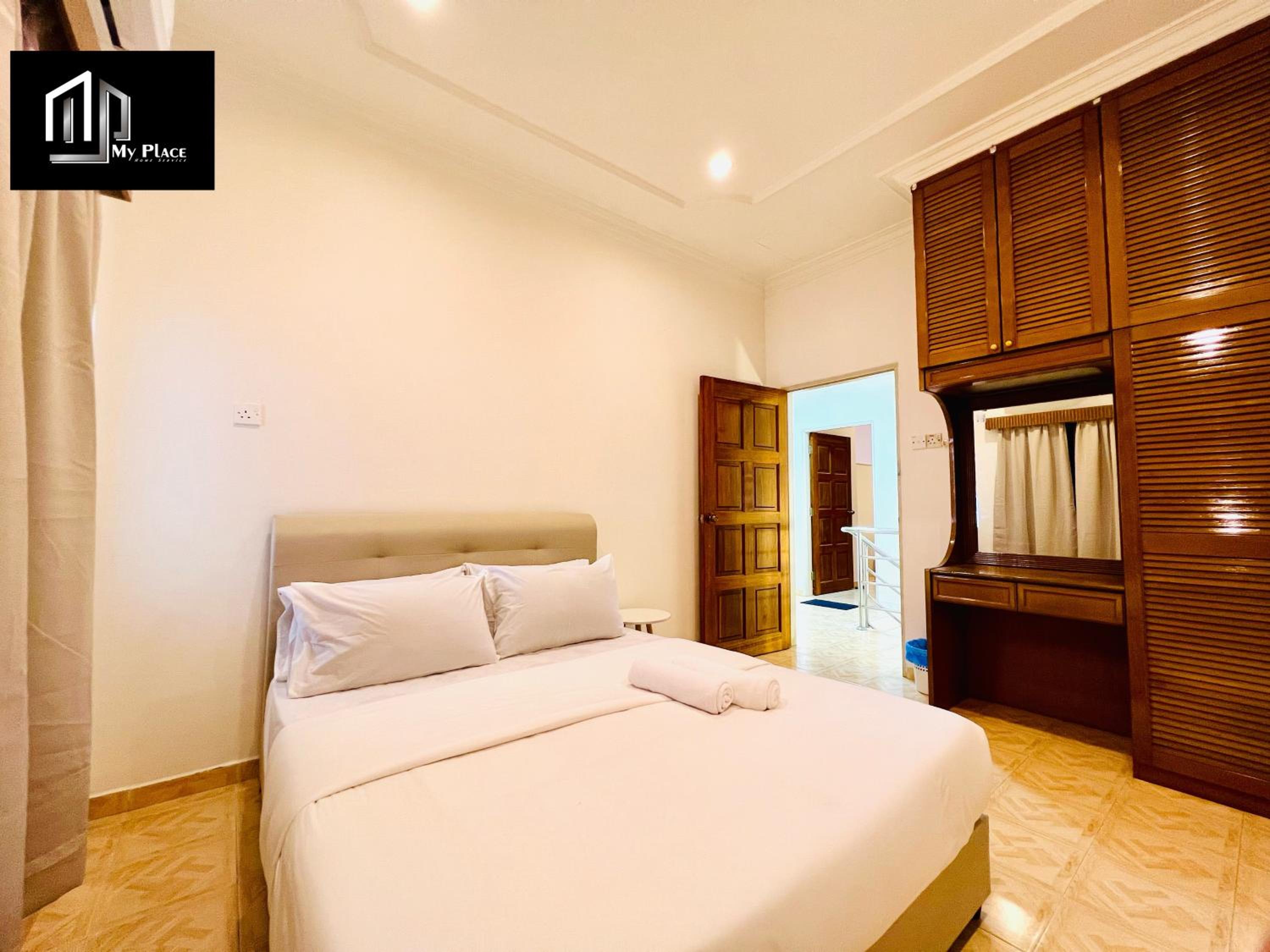 Four-Bedroom House - Photo 41