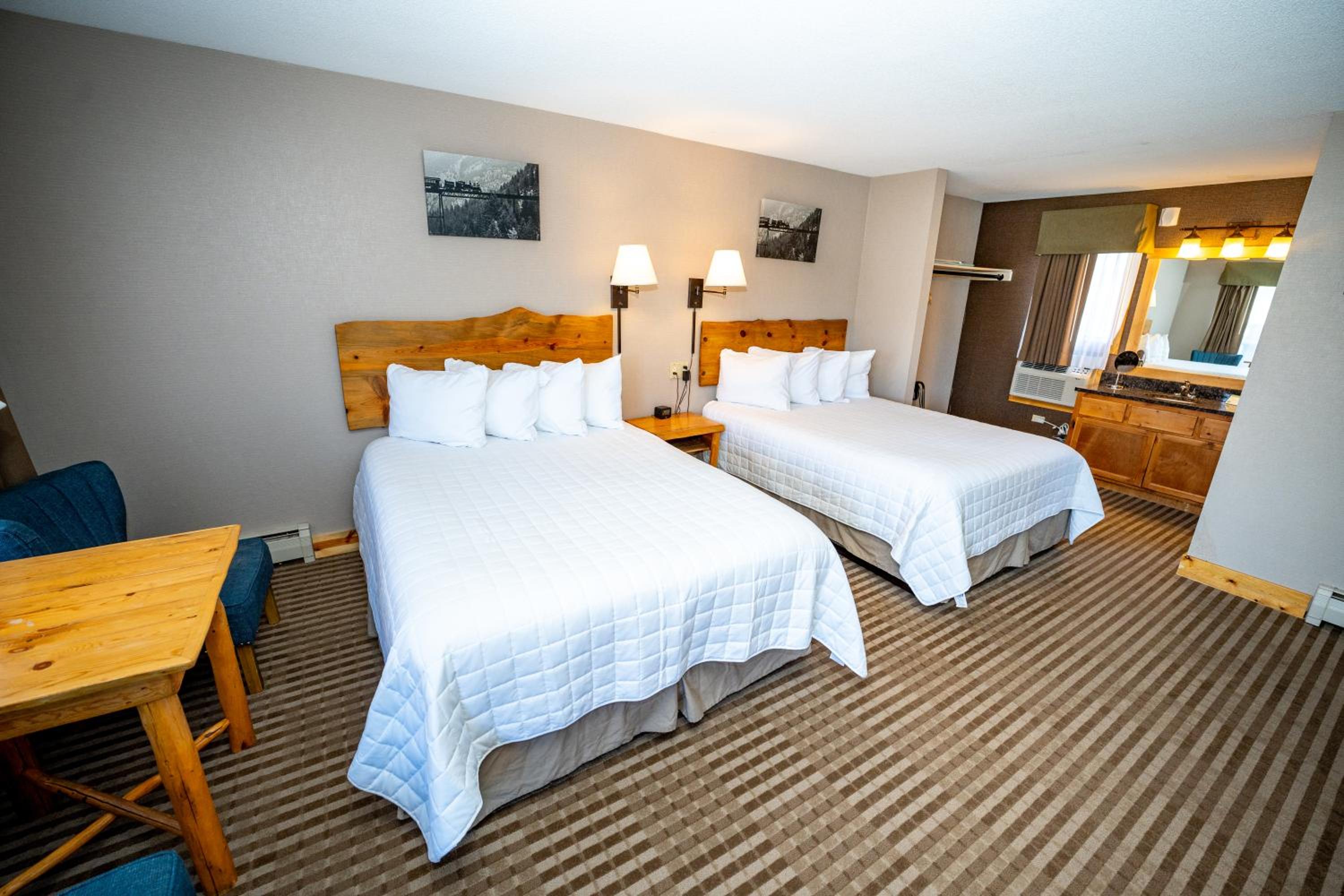 Queen Room with Two Queen Beds - Non-Pet Friendly - Photo 1