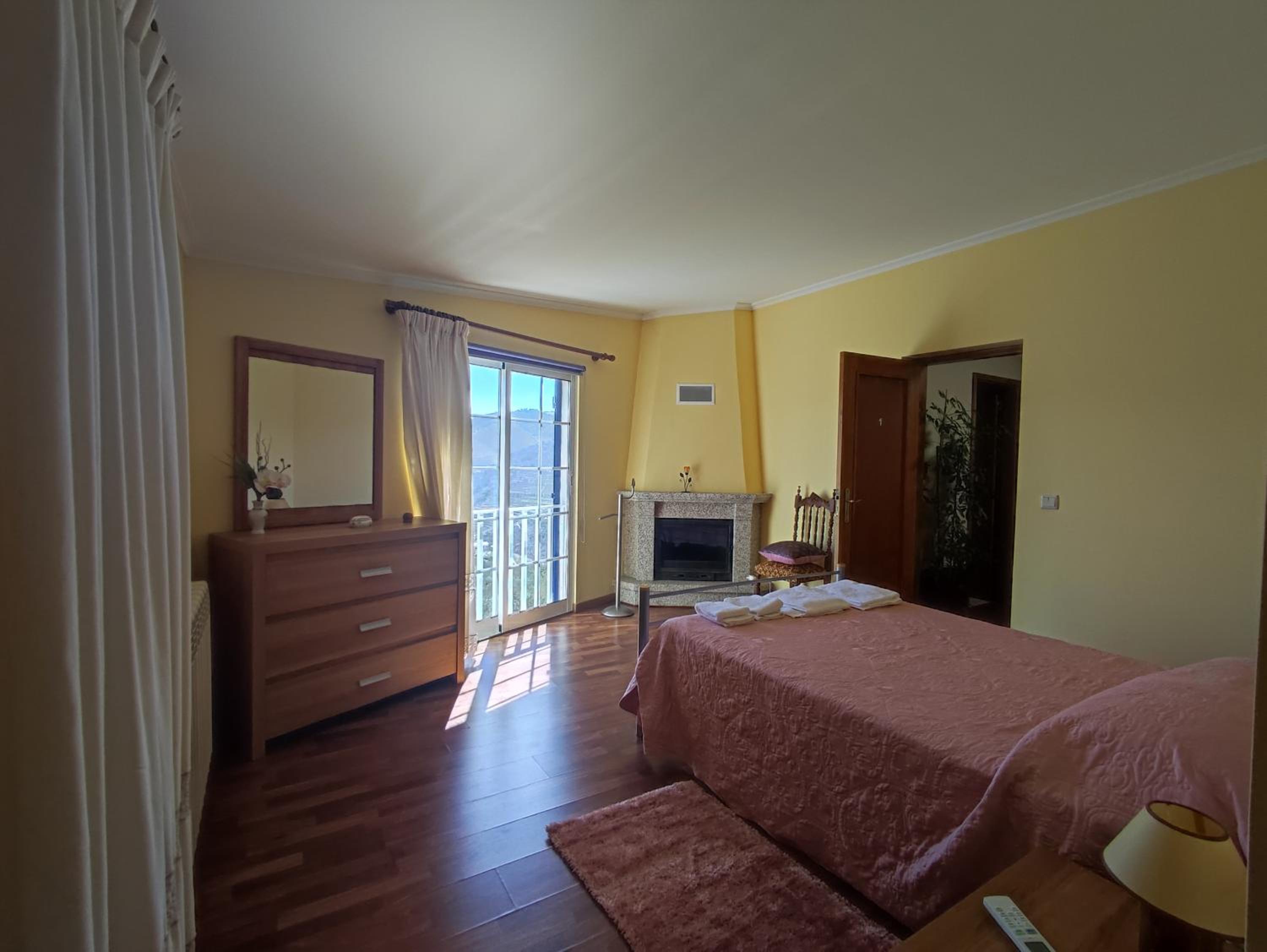 Three-Bedroom House - Photo 23