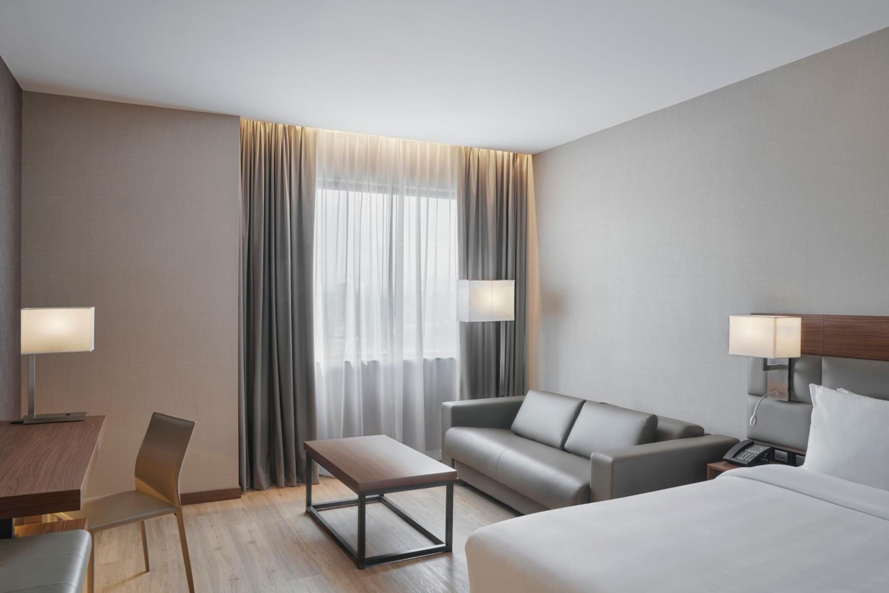 King Room with Sofa Bed and City View - Photo 5