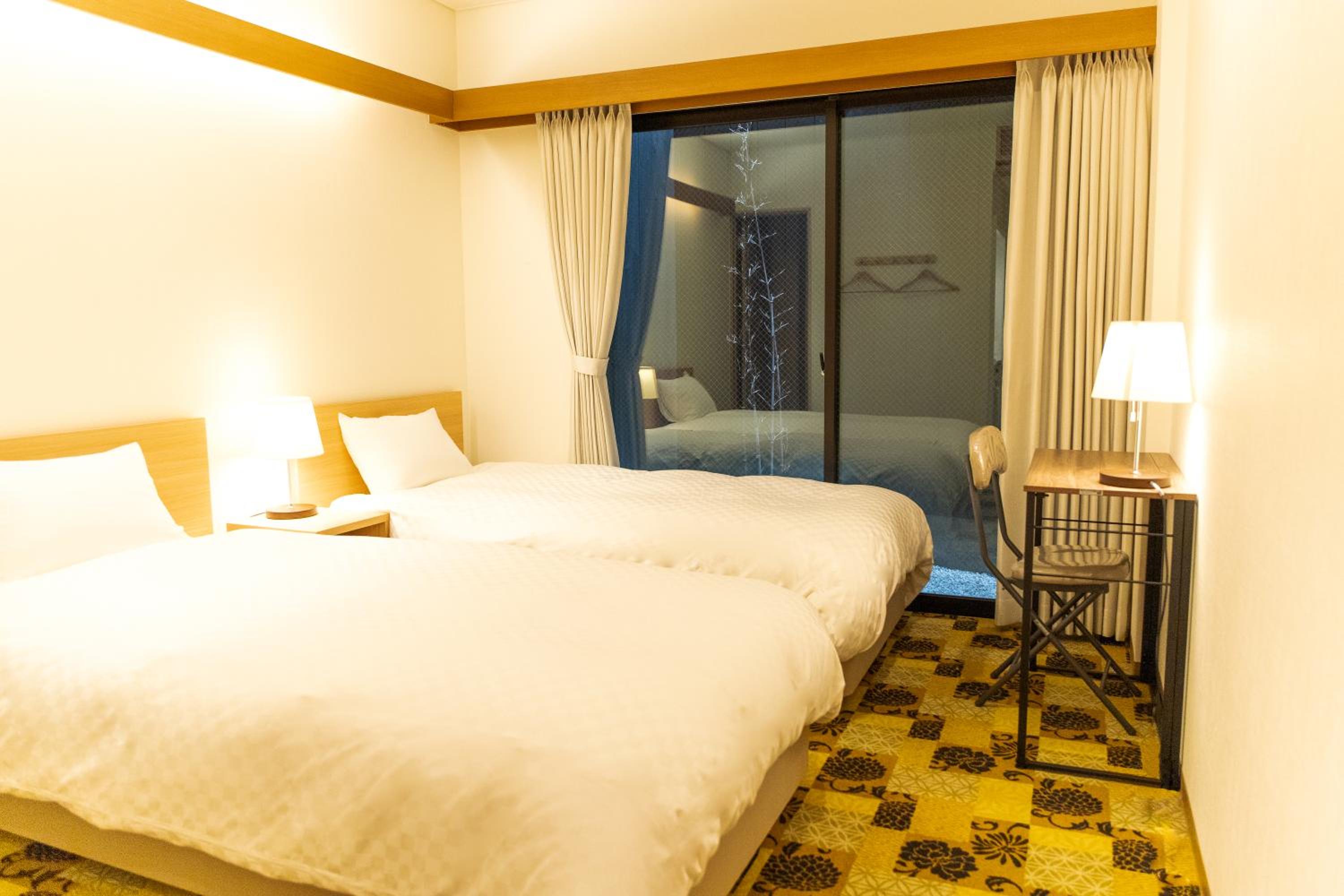 Twin Room with Private Bathroom photo 1