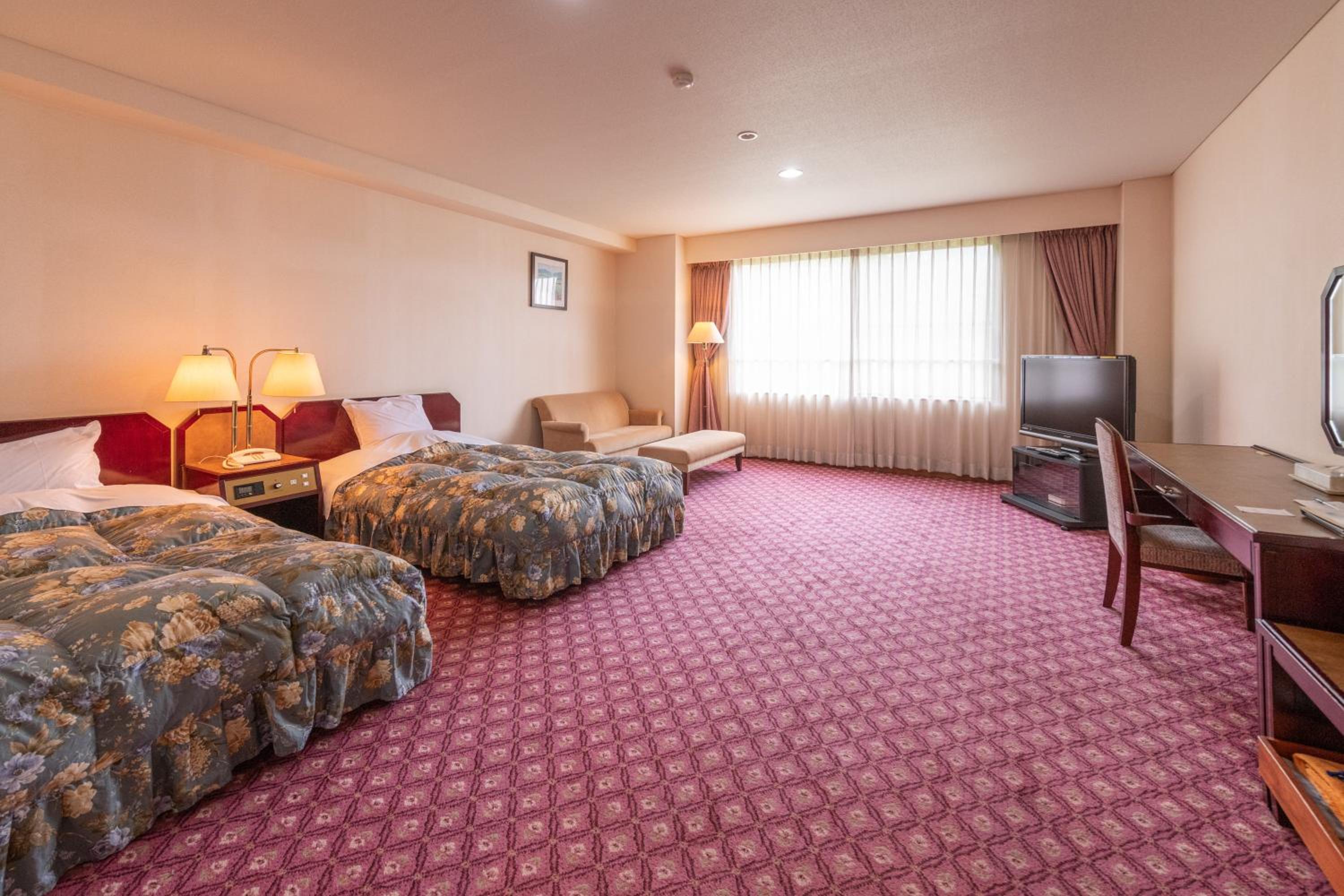 Superior Triple Corner Room  Ski Slope View photo 1