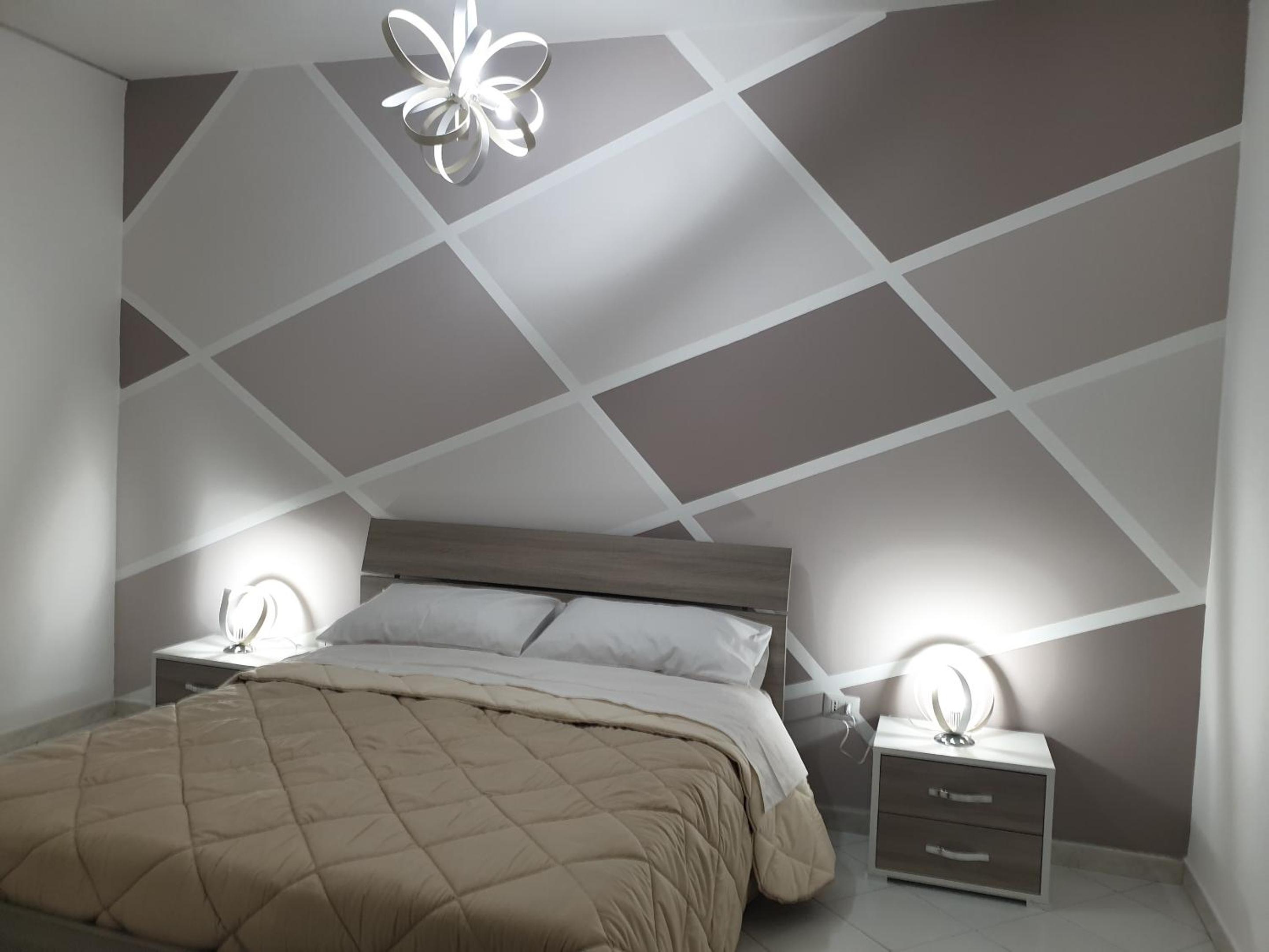 Quadruple Room with Shower - Photo 1