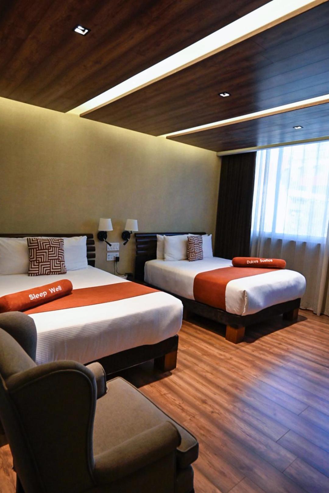 Deluxe Queen Room with Two Queen Beds - Photo 14
