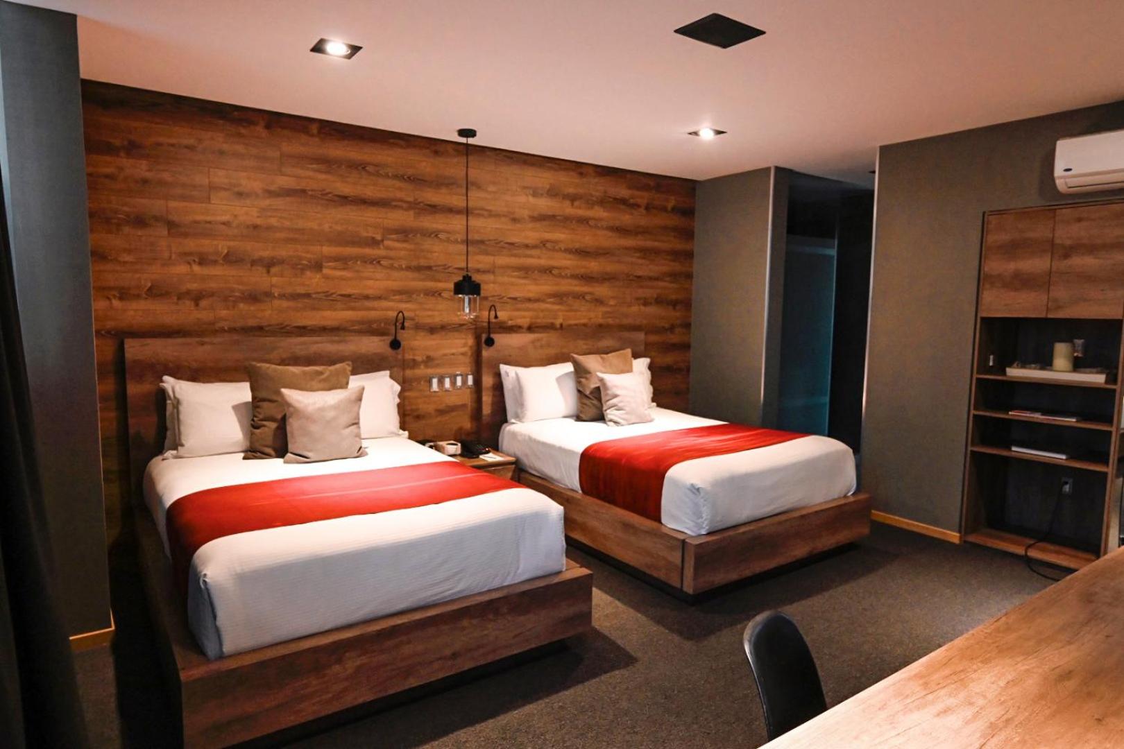 Deluxe Queen Room with Two Queen Beds - Photo 1