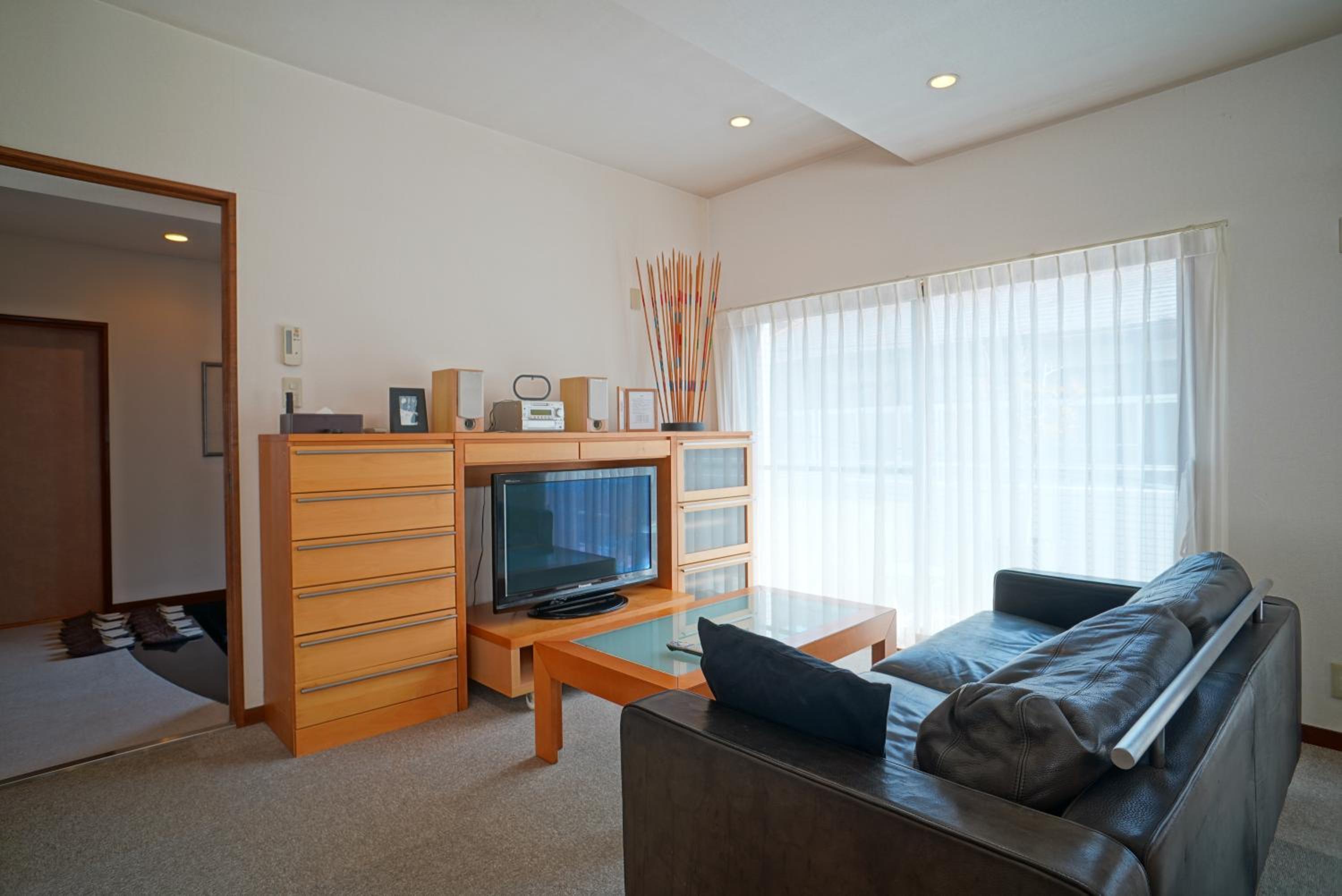 Three-Bedroom Apartment - Photo 1