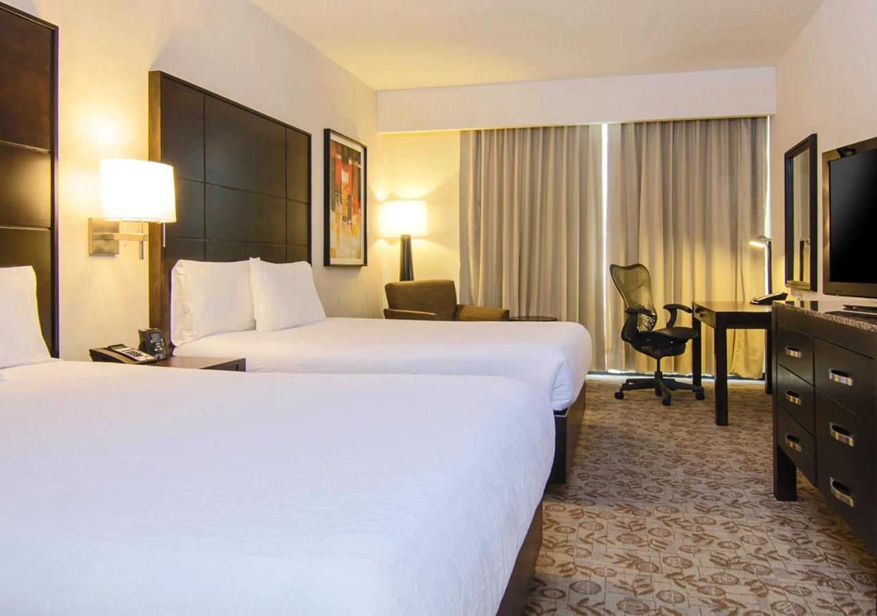 Queen Room with Two Queen Beds - Photo 9