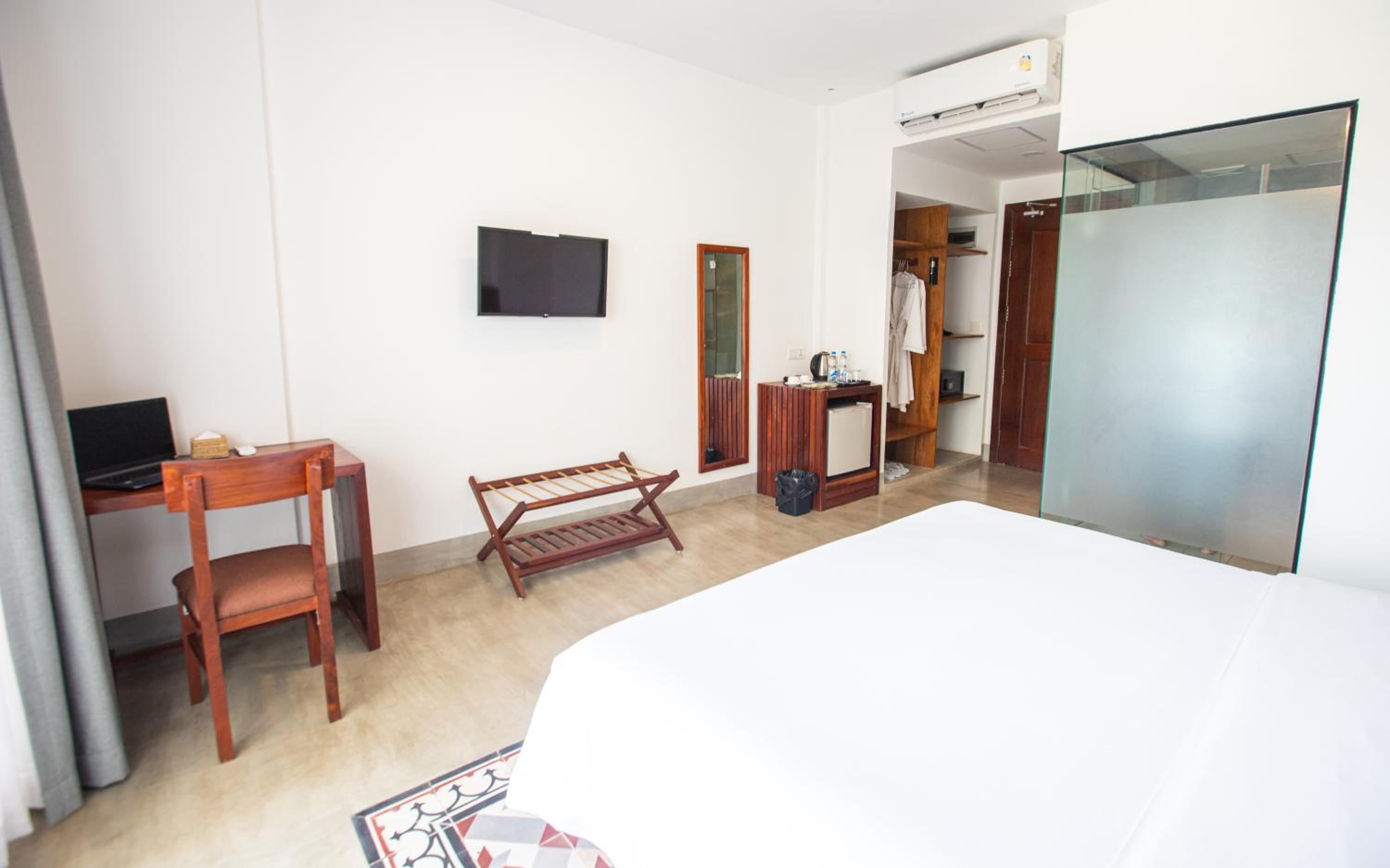 Deluxe Single Room - Photo 12