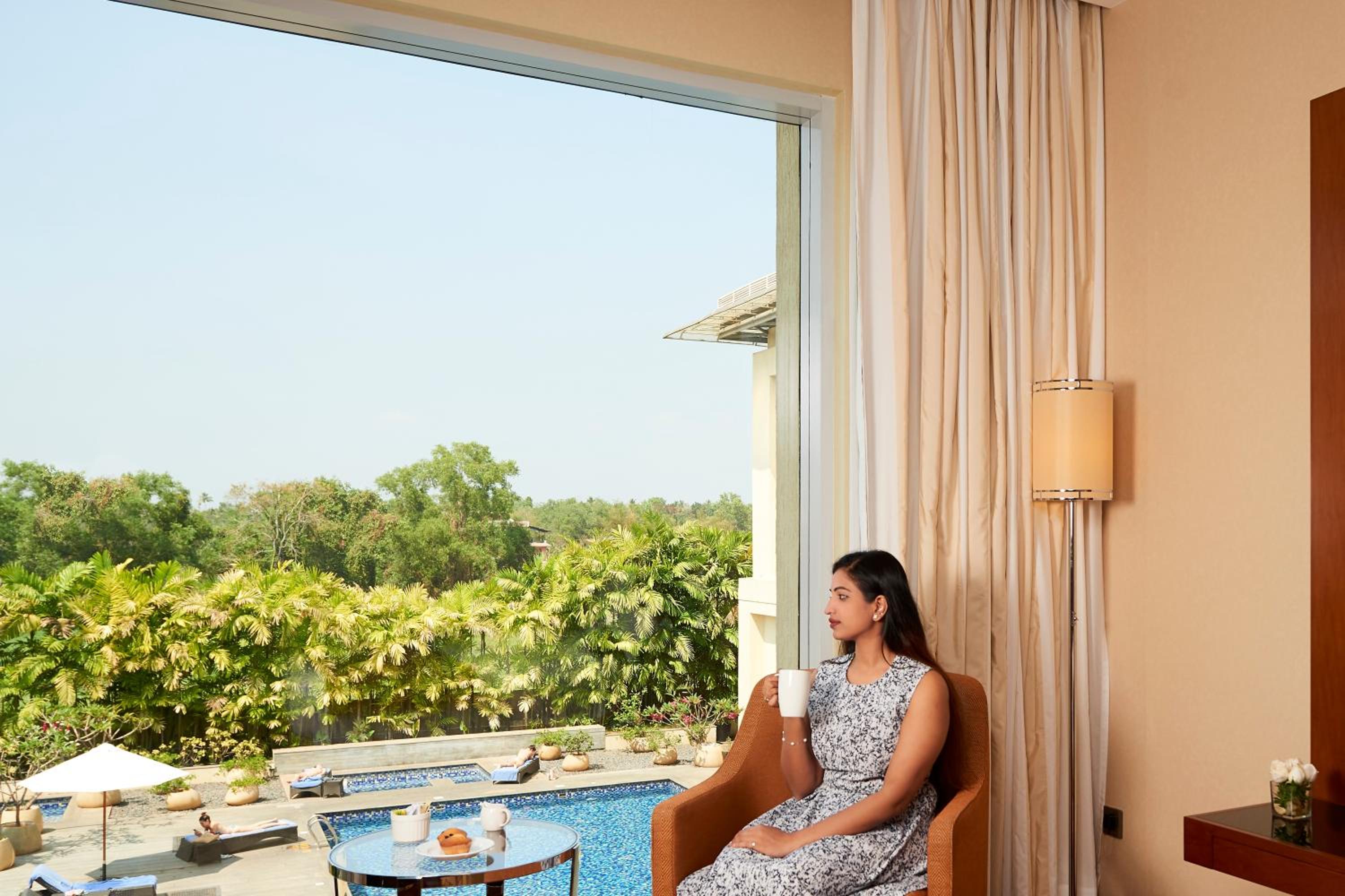 Executive Twin Room with complimentary two-way airport transfers, Executive Lounge Access. INR 500 hotel credit per room per night, Access to Taberna Bar with unlimited beverages for two hours photo