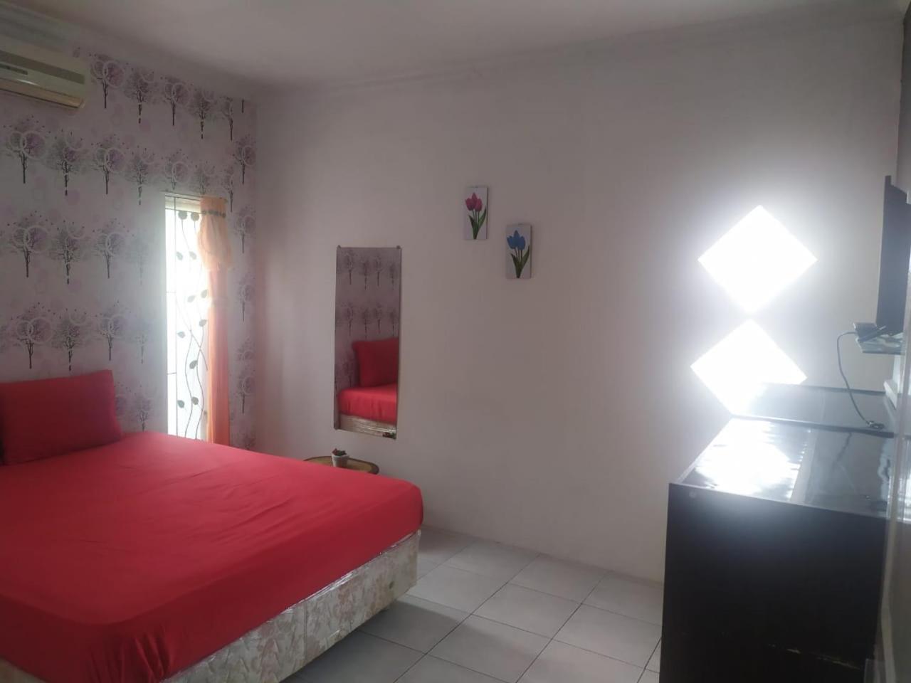 Three-Bedroom House - Photo 16