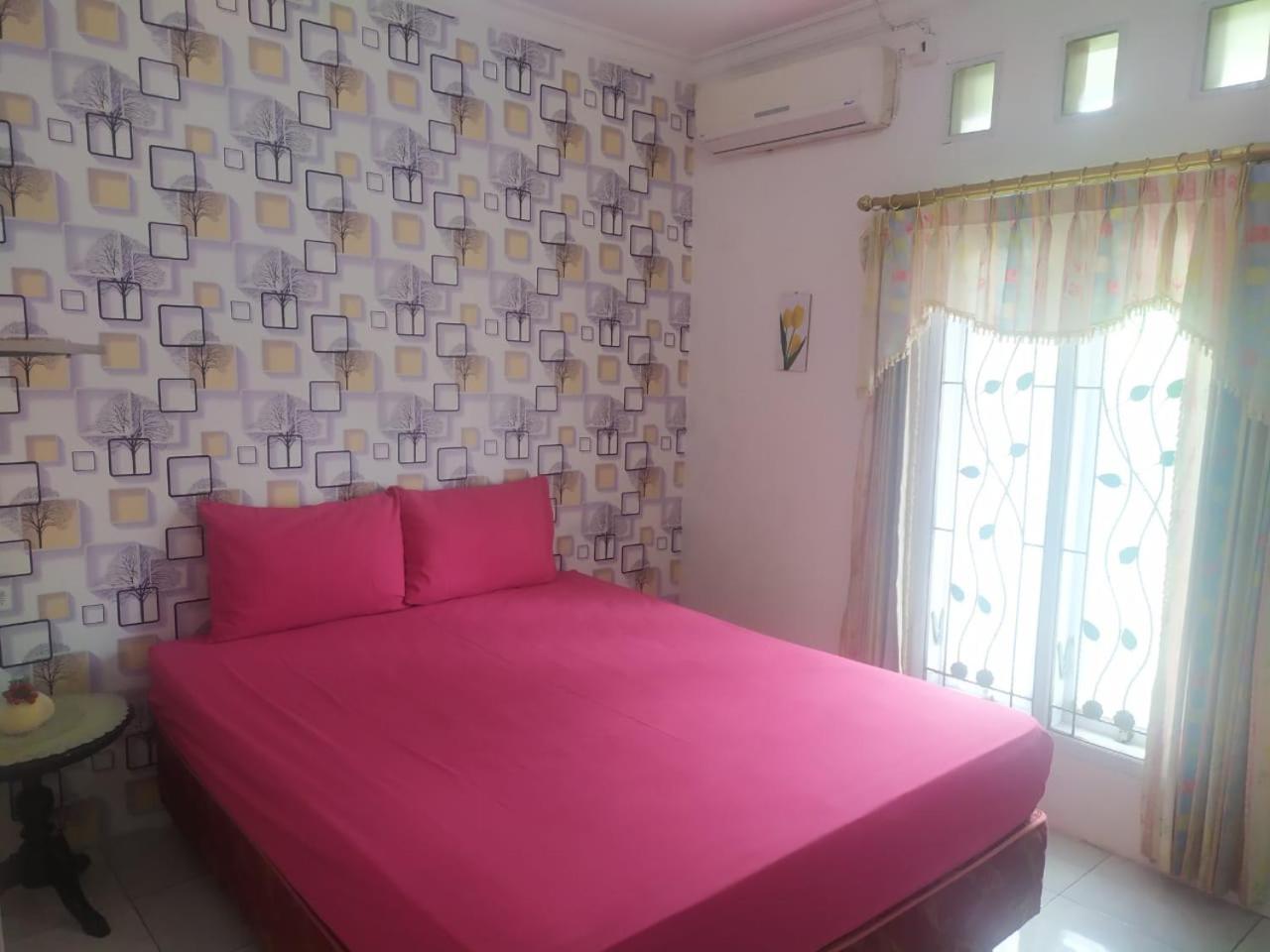 Three-Bedroom House - Photo 19