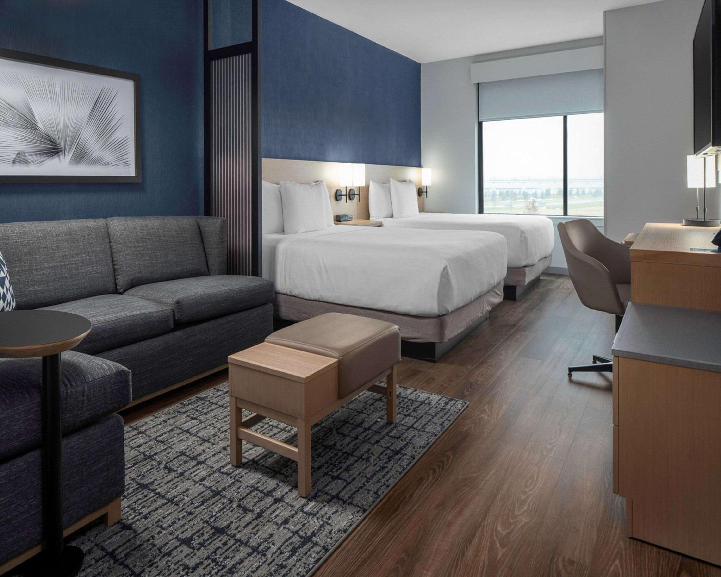 Queen Room with Two Queen Beds and Sofa Bed - High Floor