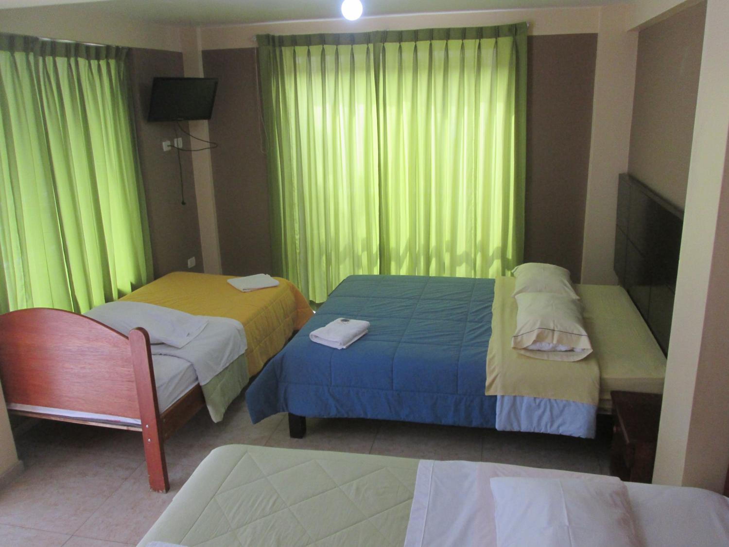 Quadruple Room with Private Bathroom photo 1
