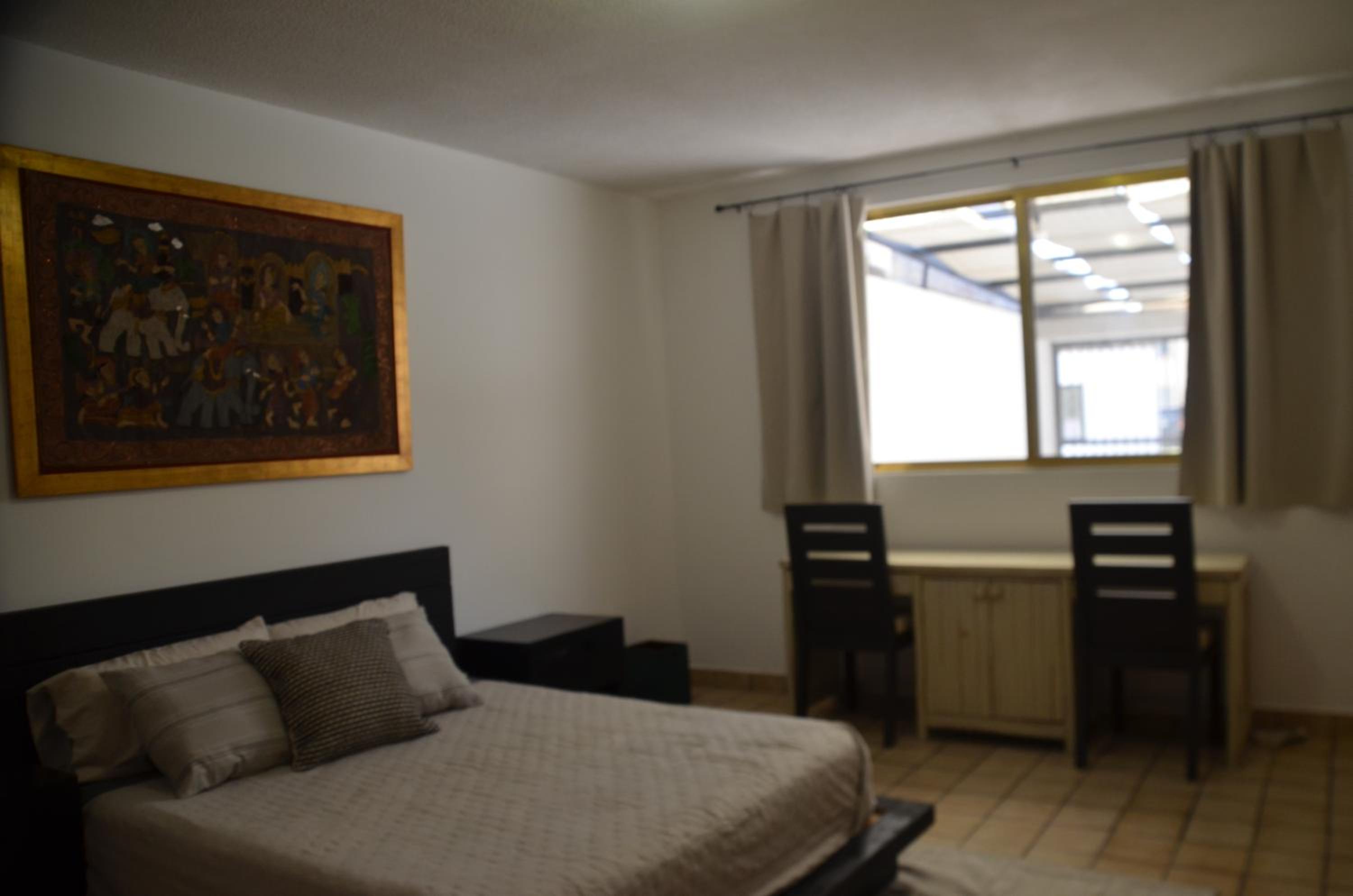 Queen Room with Shared Bathroom
