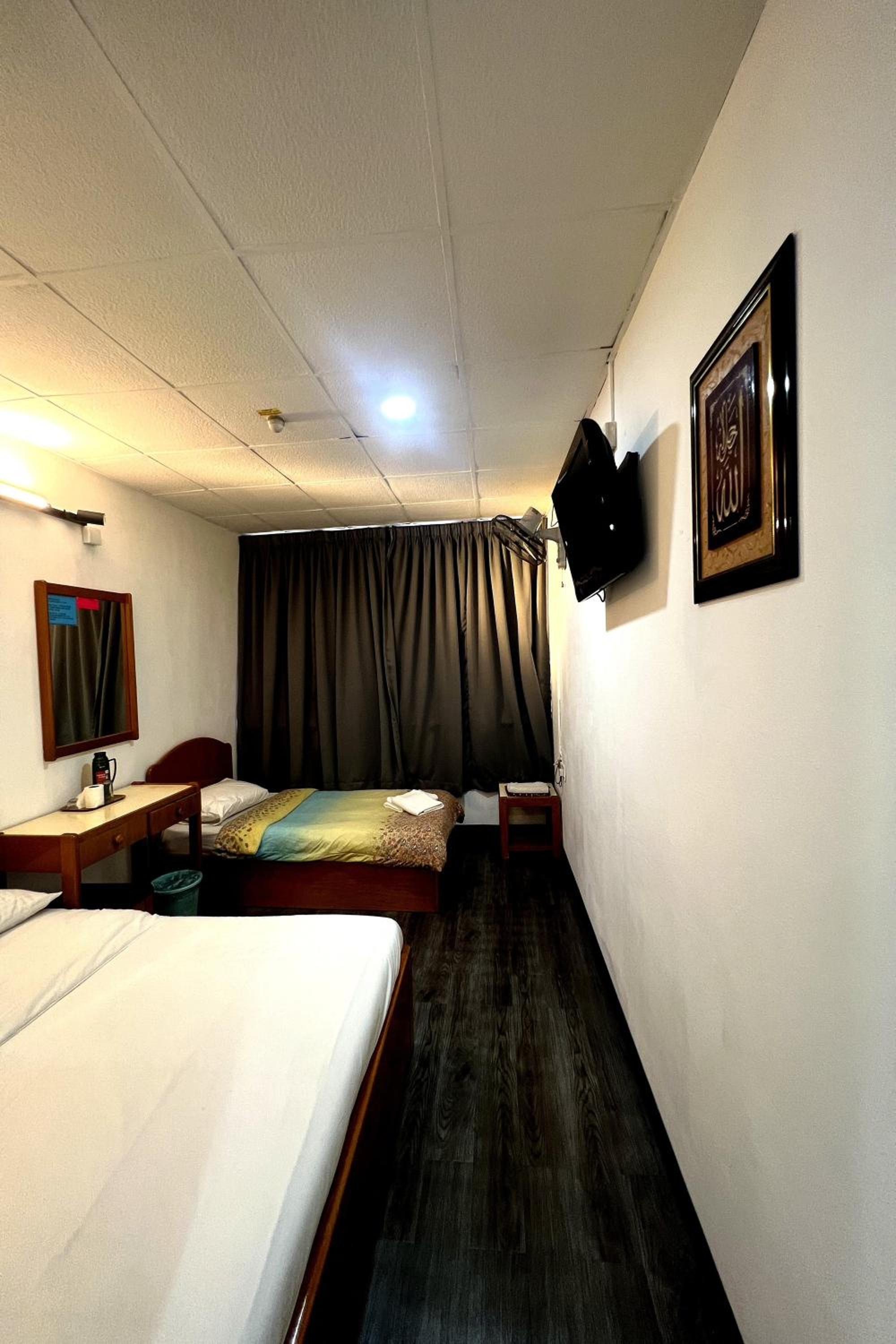 Deluxe Triple Room - Photo 1