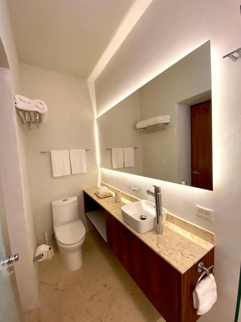 Deluxe Family Suite - Photo 11
