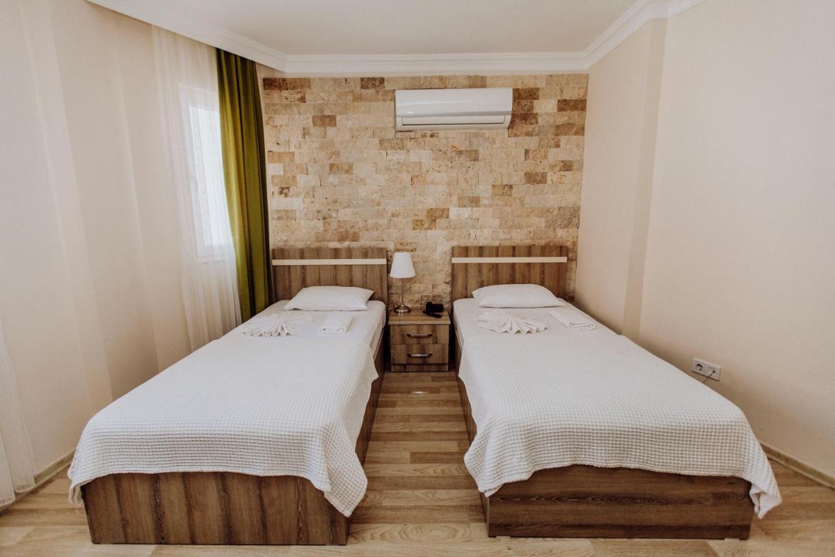 Standard Twin Room - Photo 4