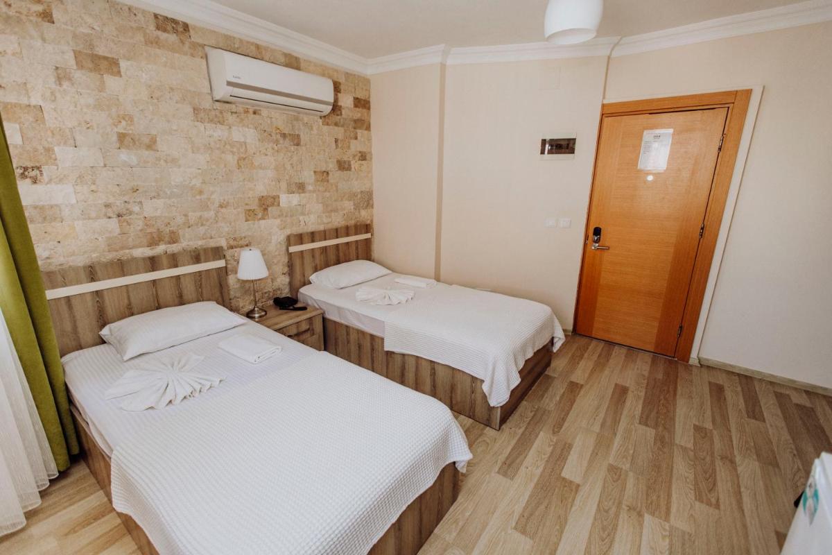 Standard Twin Room - Photo 3