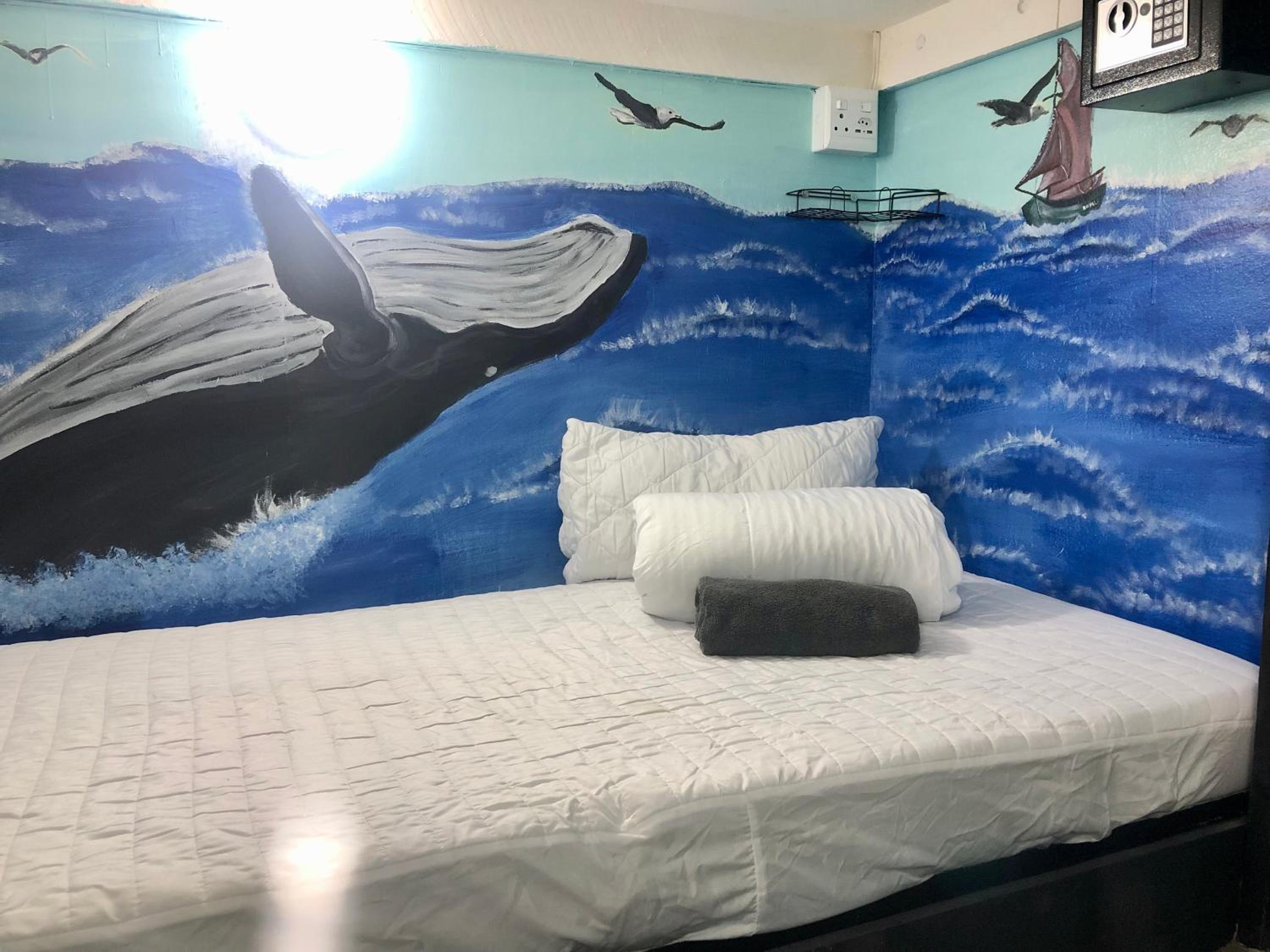 Single Bed in Dormitory Room