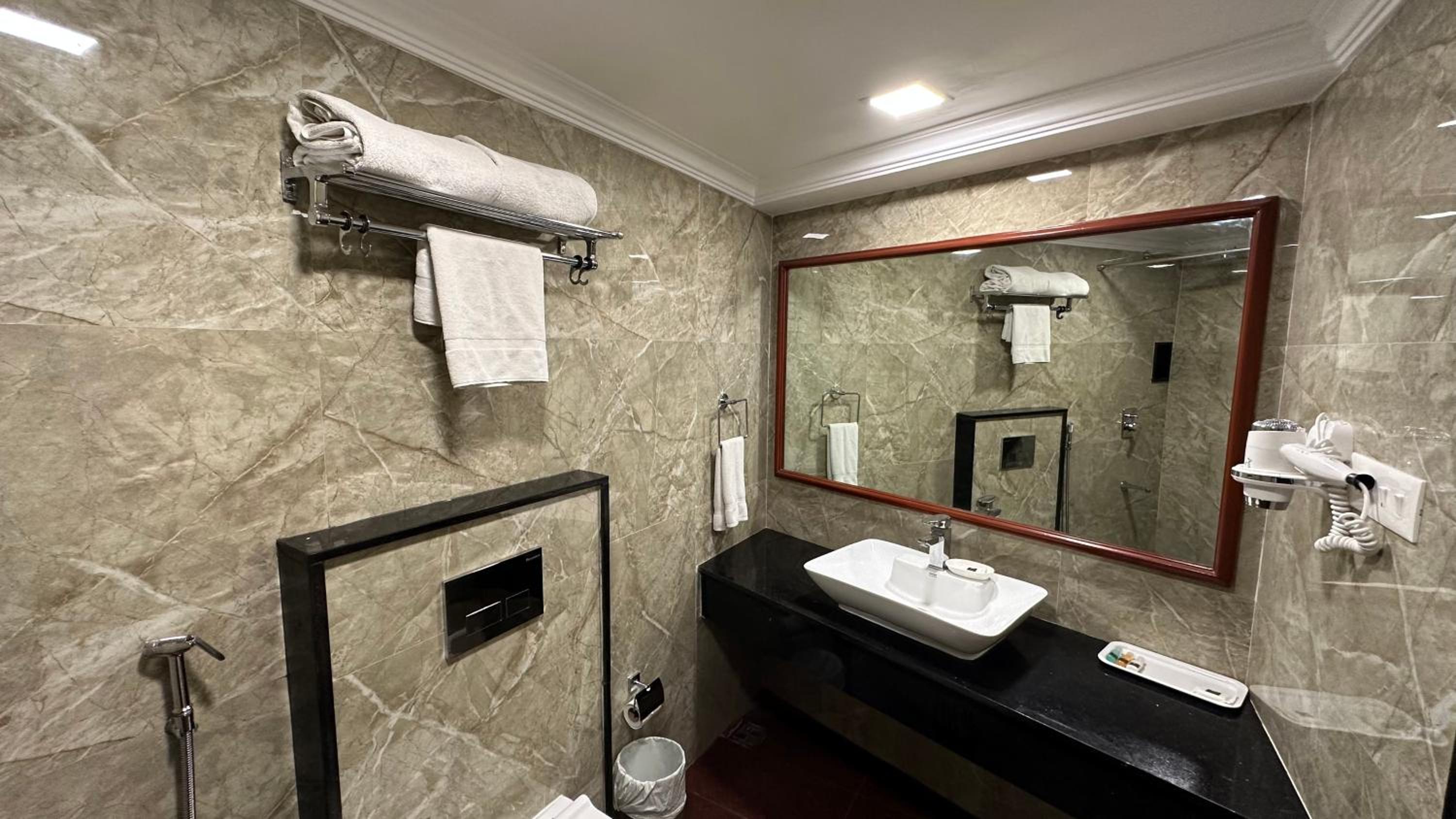 Premium Triple Room - Photo 16
