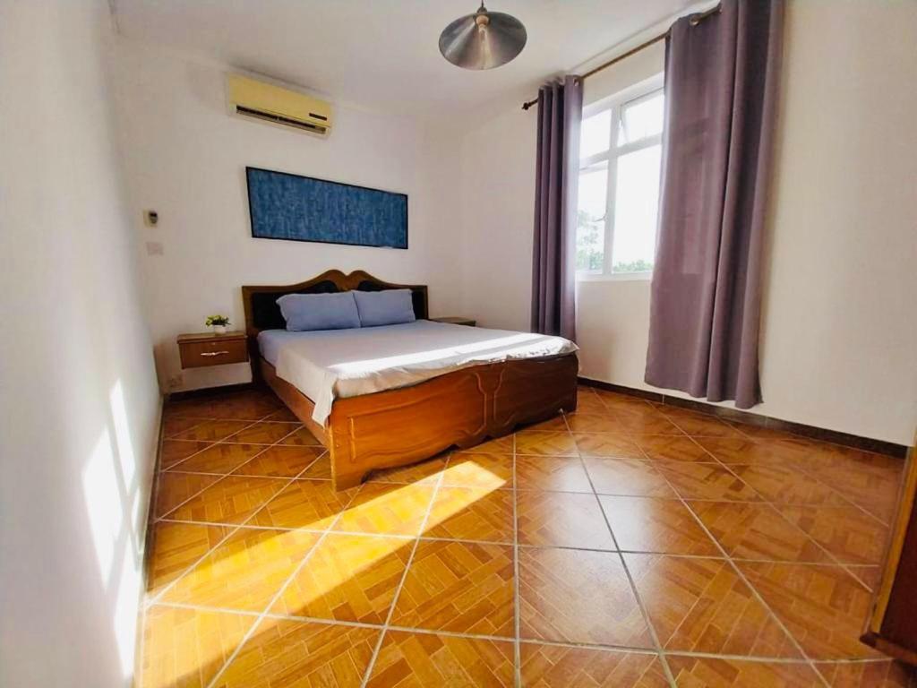 Three-Bedroom Apartment photo 1