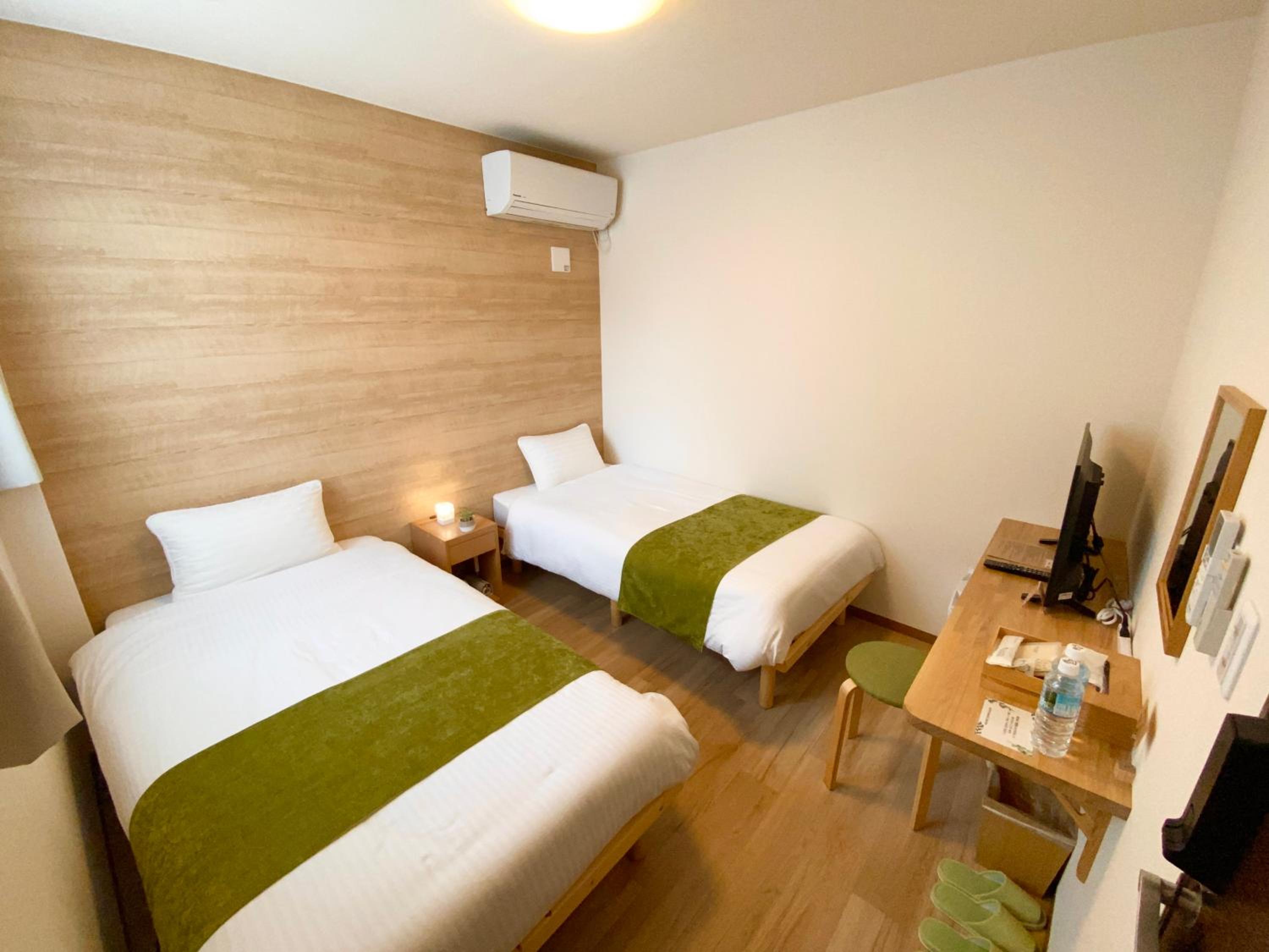 Twin Room - Photo 1