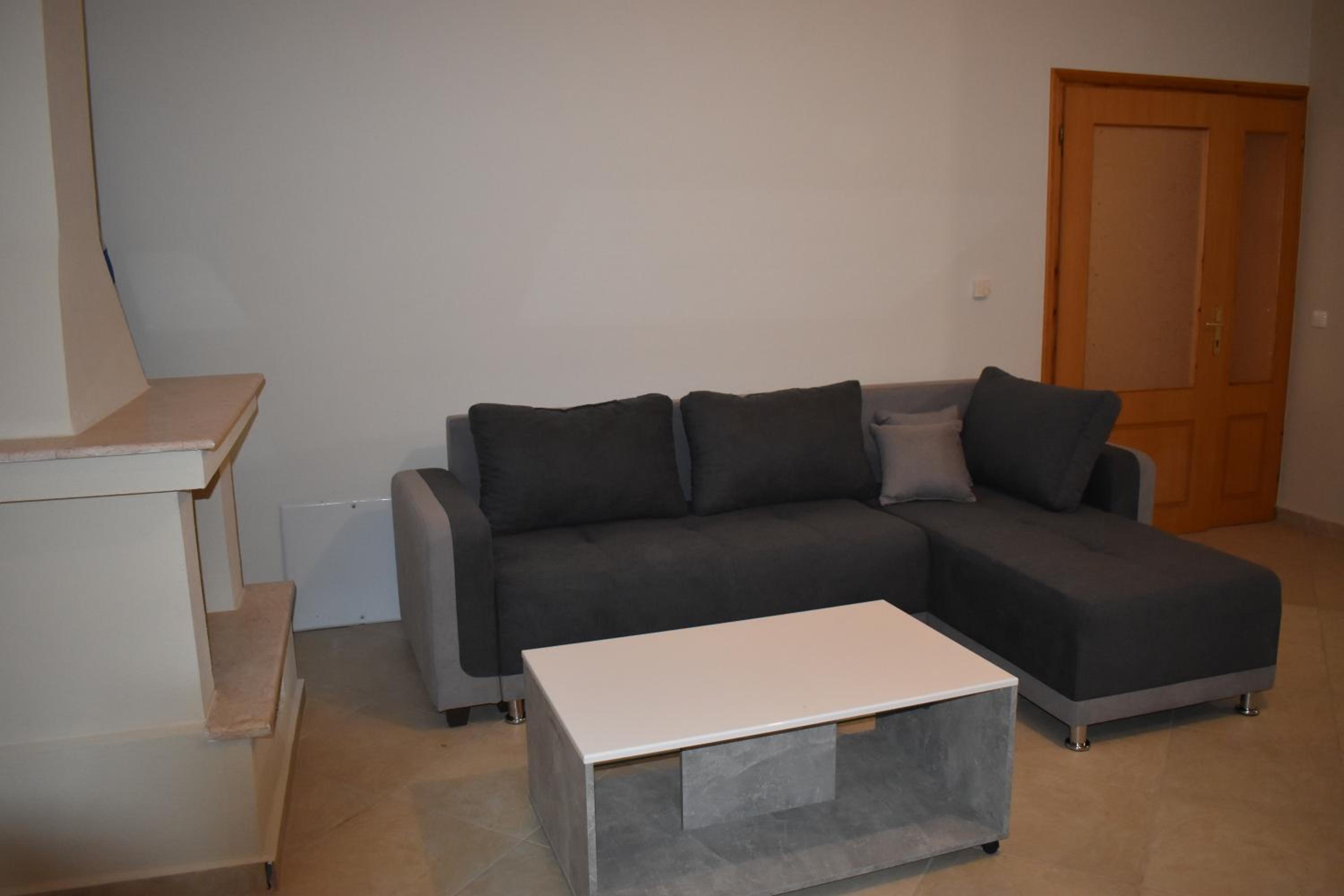 Three-Bedroom Apartment photo 1