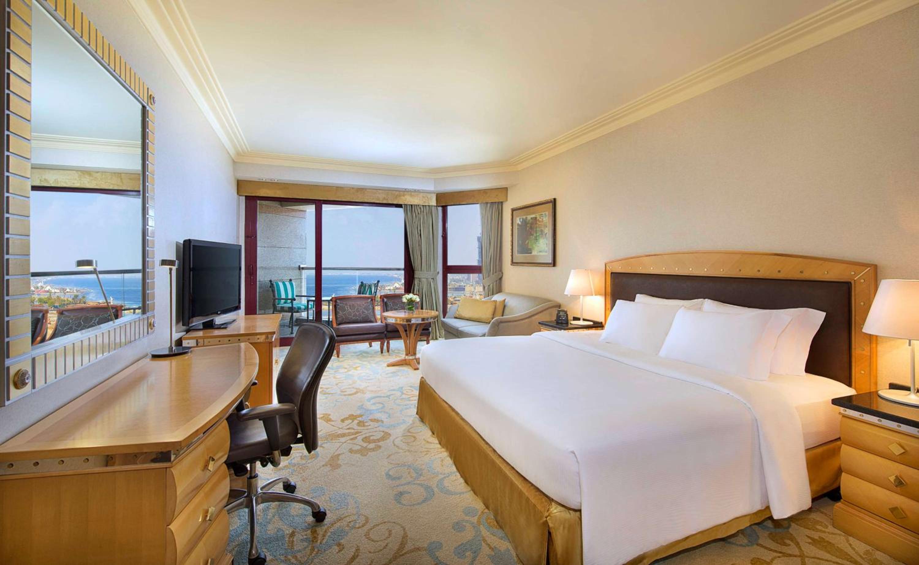 Deluxe King Room with Partial Sea View - Photo 1