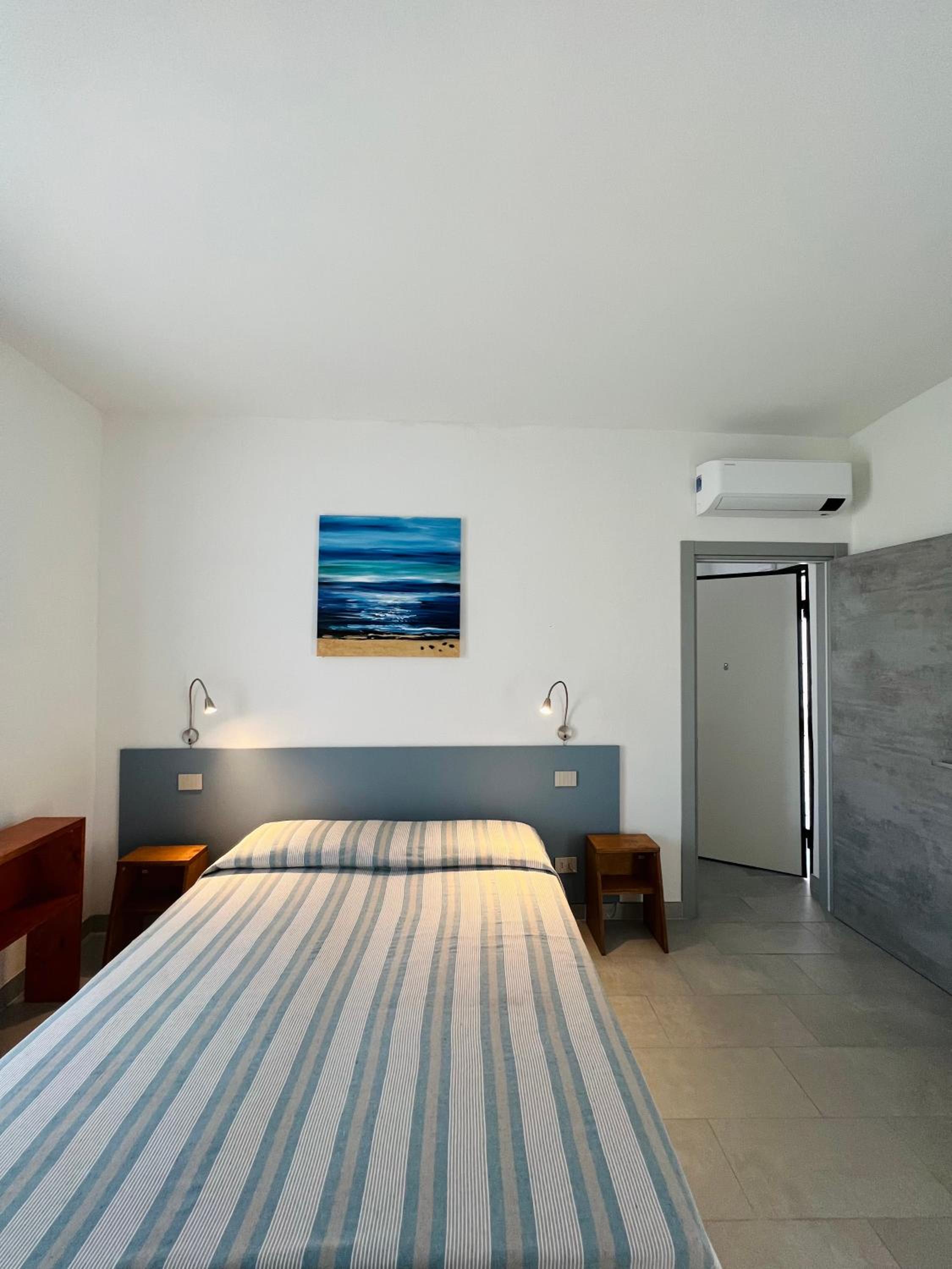 Quadruple Room with Private Bathroom