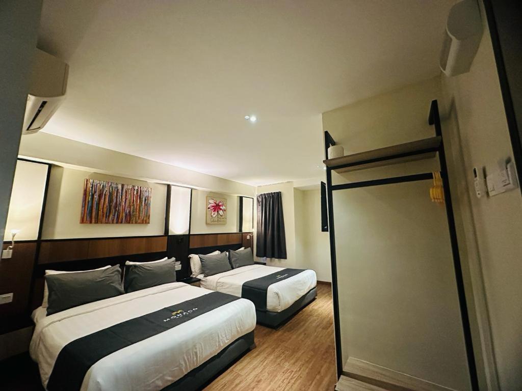 Deluxe Queen Room with Two Queen Beds photo 1
