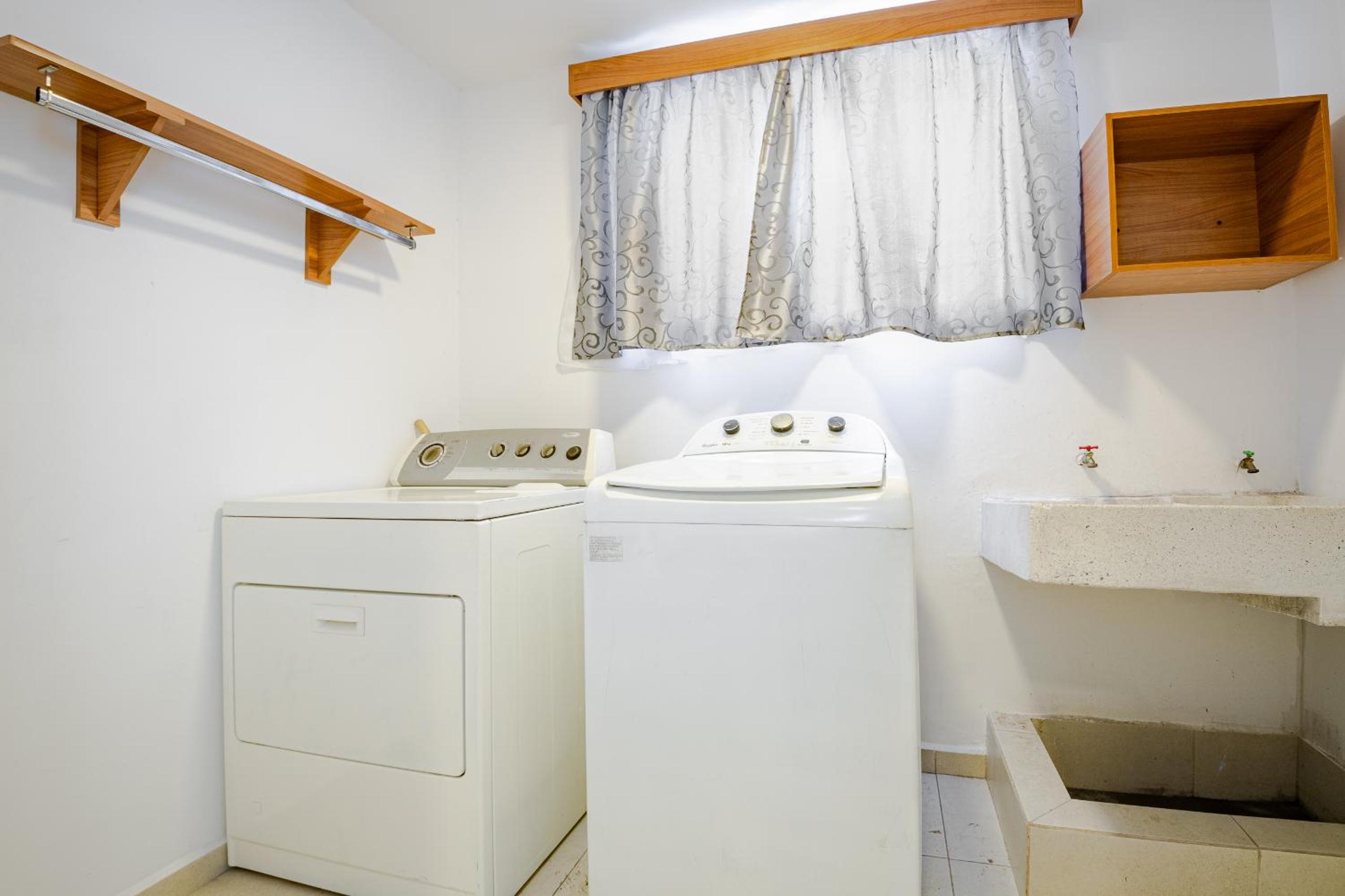 Three-Bedroom House - Photo 30