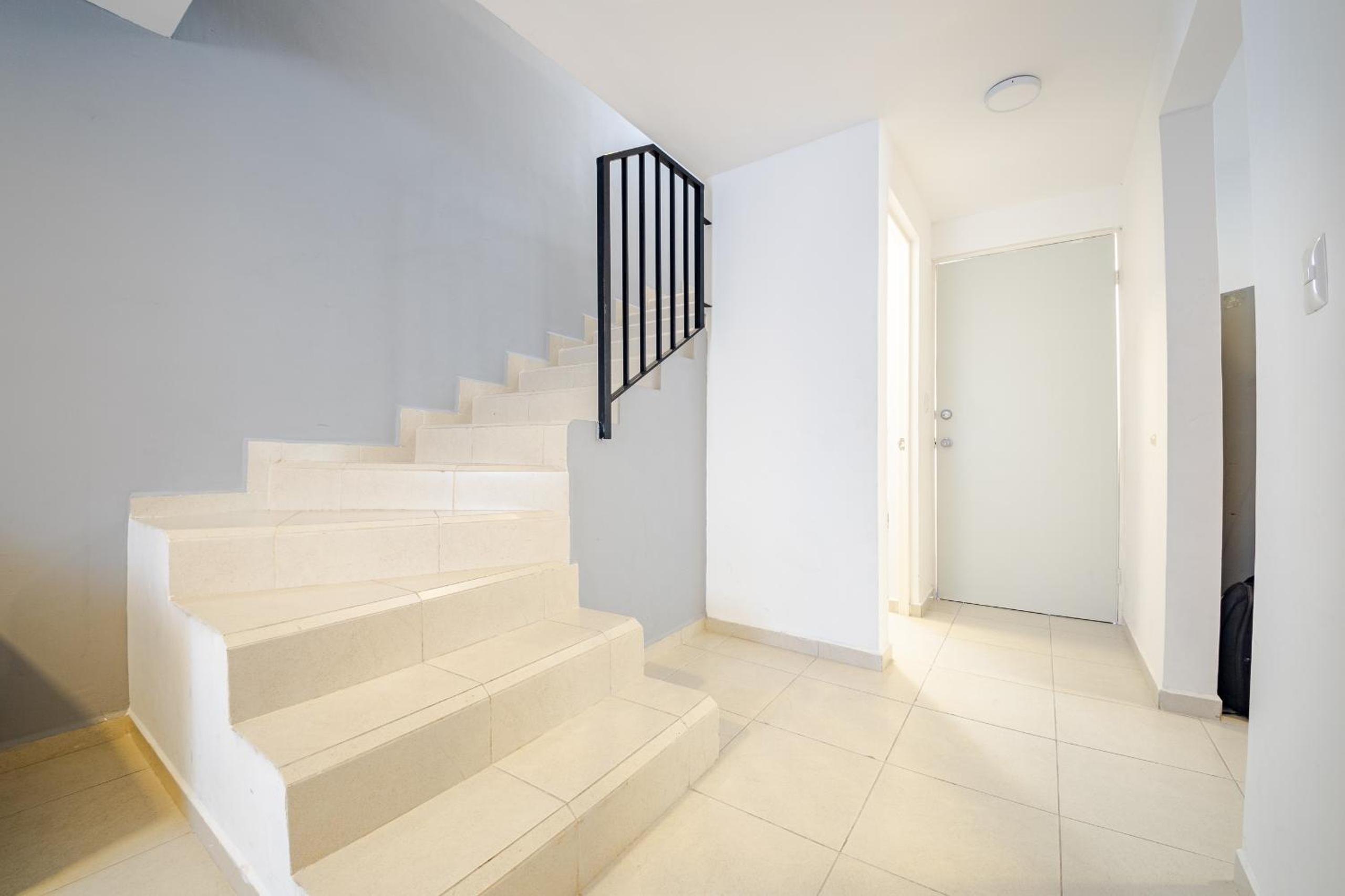 Three-Bedroom House - Photo 29