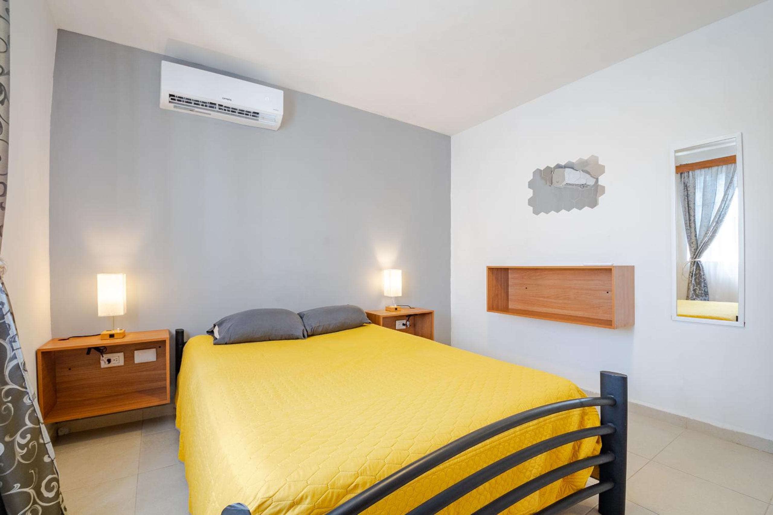 Three-Bedroom House - Photo 25