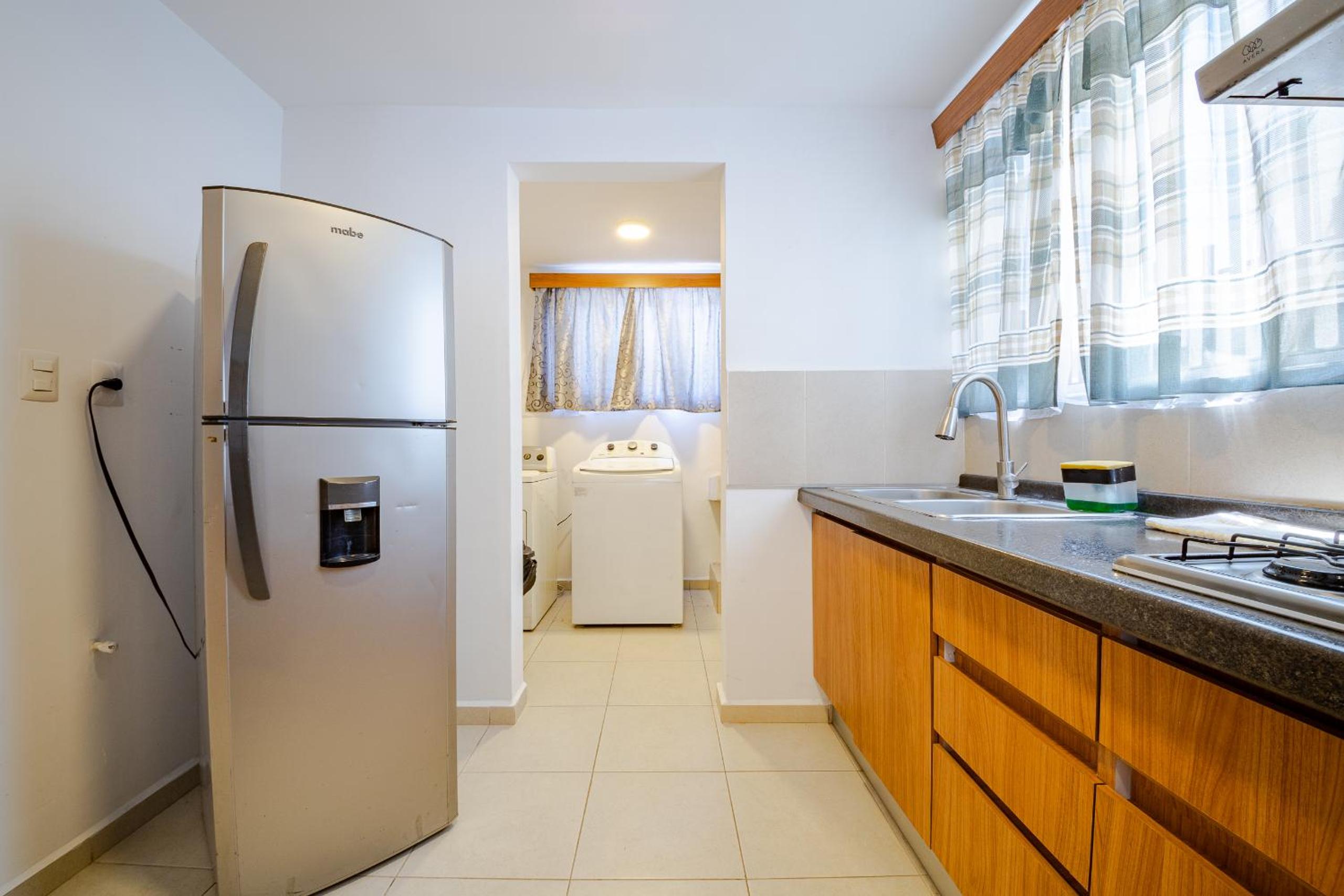 Three-Bedroom House - Photo 23