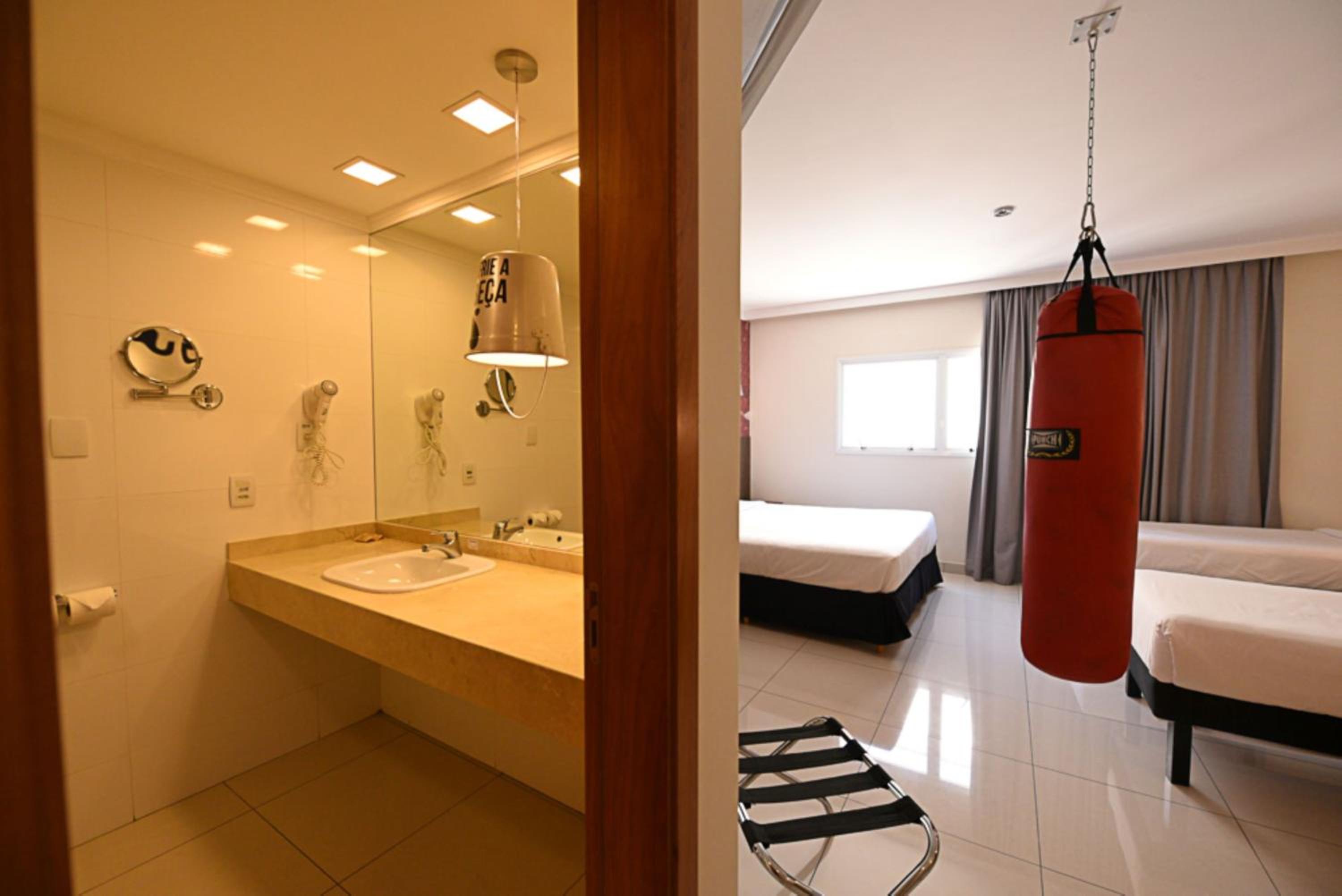 Luxury Suite With One Double And Twin Beds