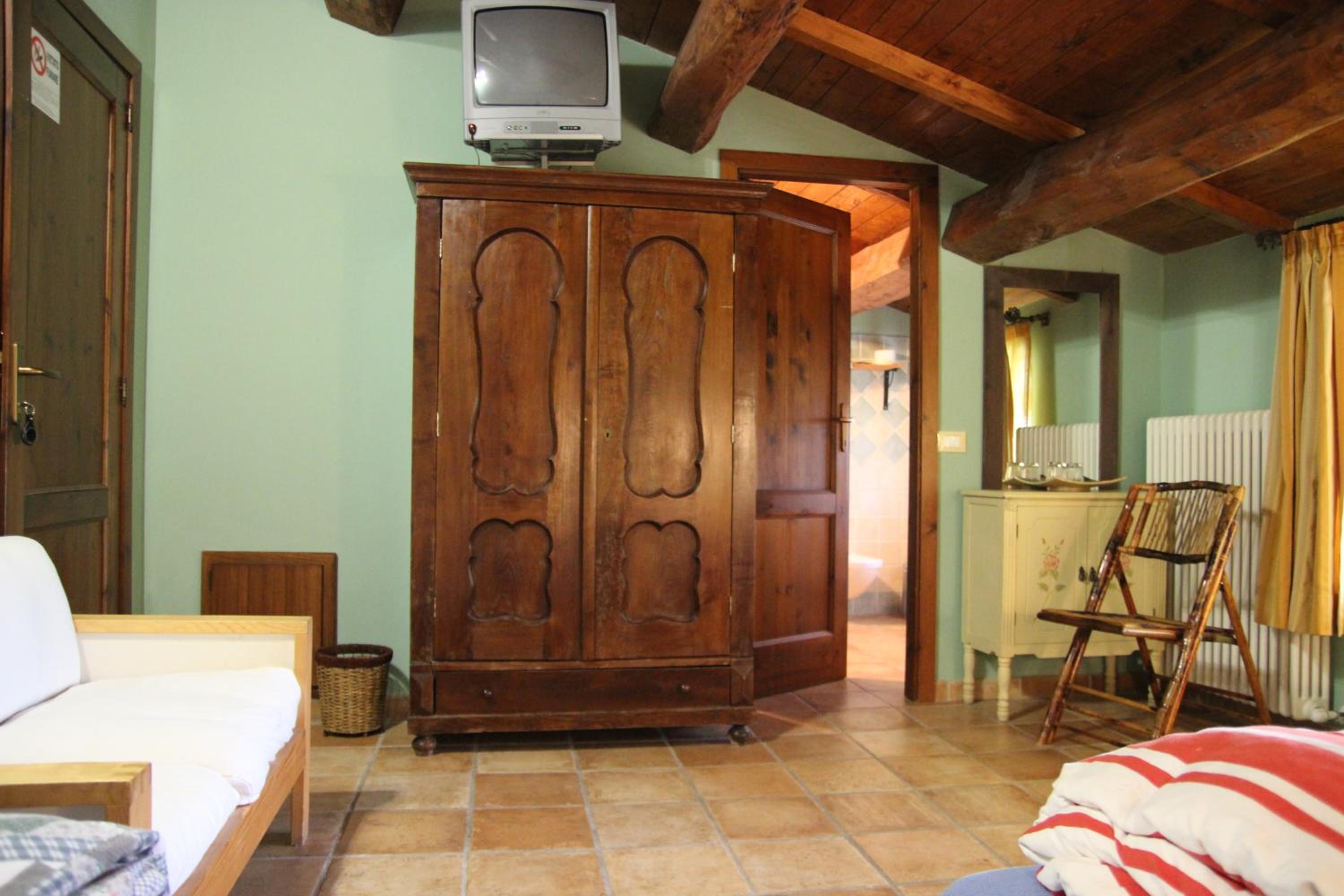 Quadruple Room - Photo 9