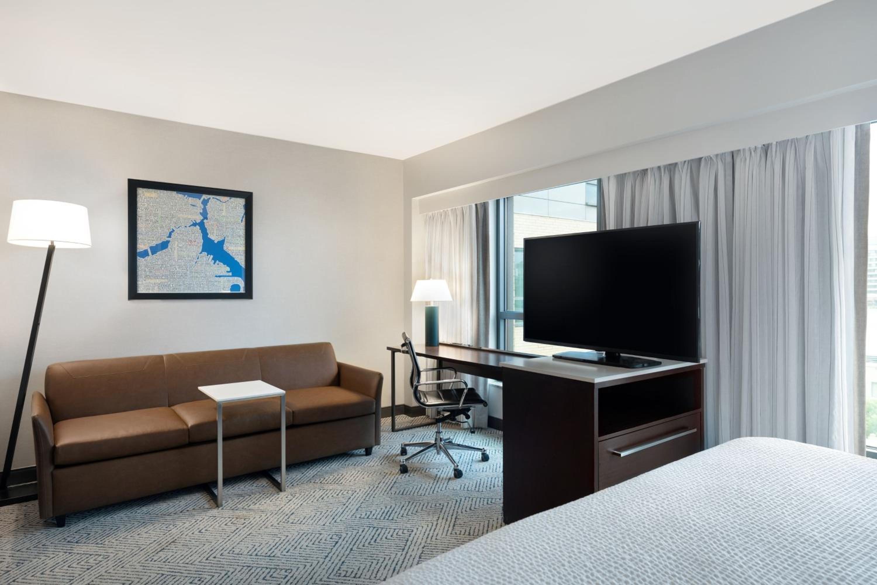 King Studio Suite with Sofa Bed and Roll-in Shower - Mobility and Hearing Accessible