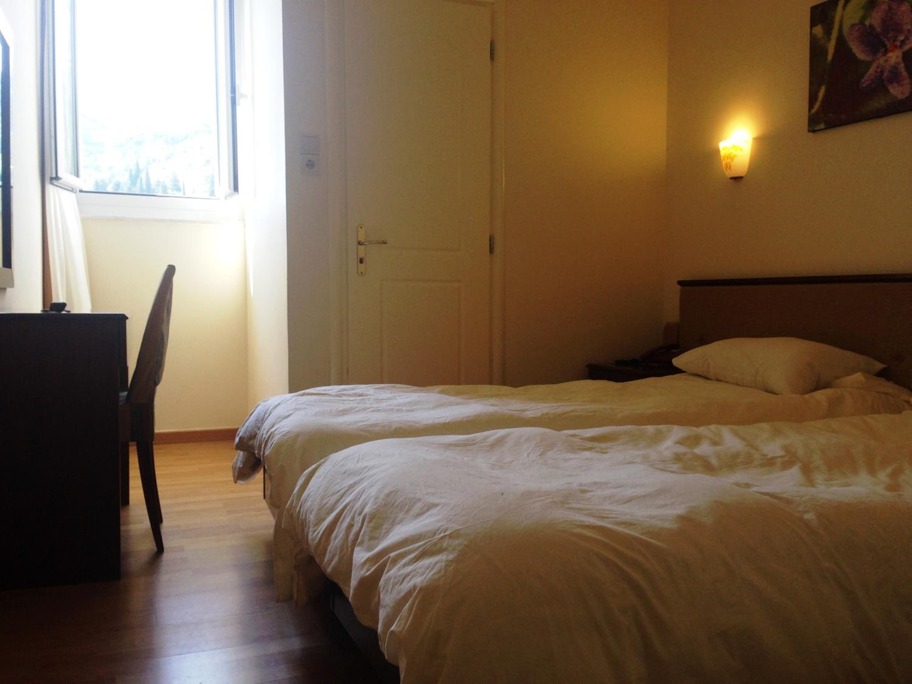 Economy Quadruple Room - Photo 1