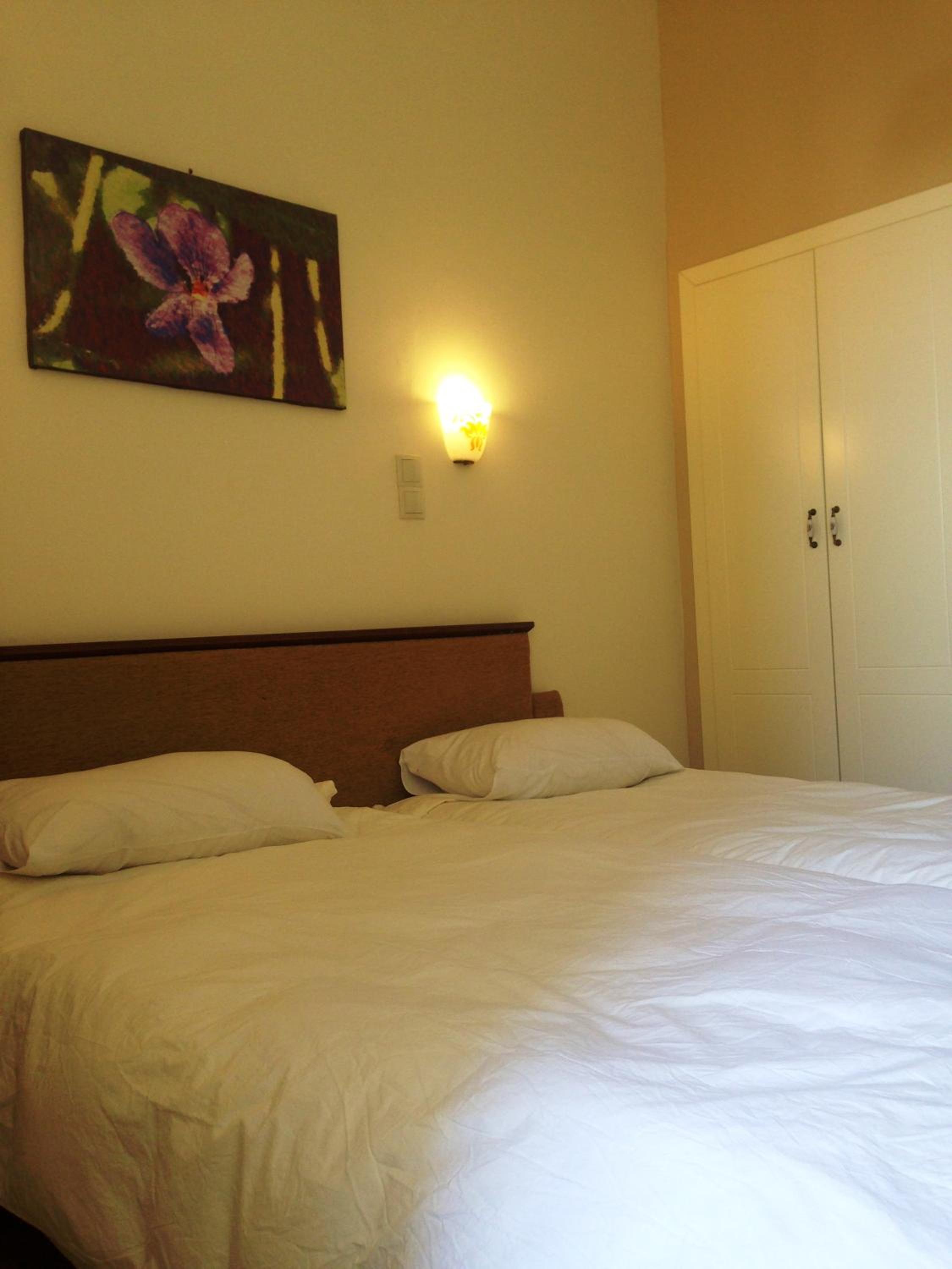 Economy Quadruple Room - Photo 5