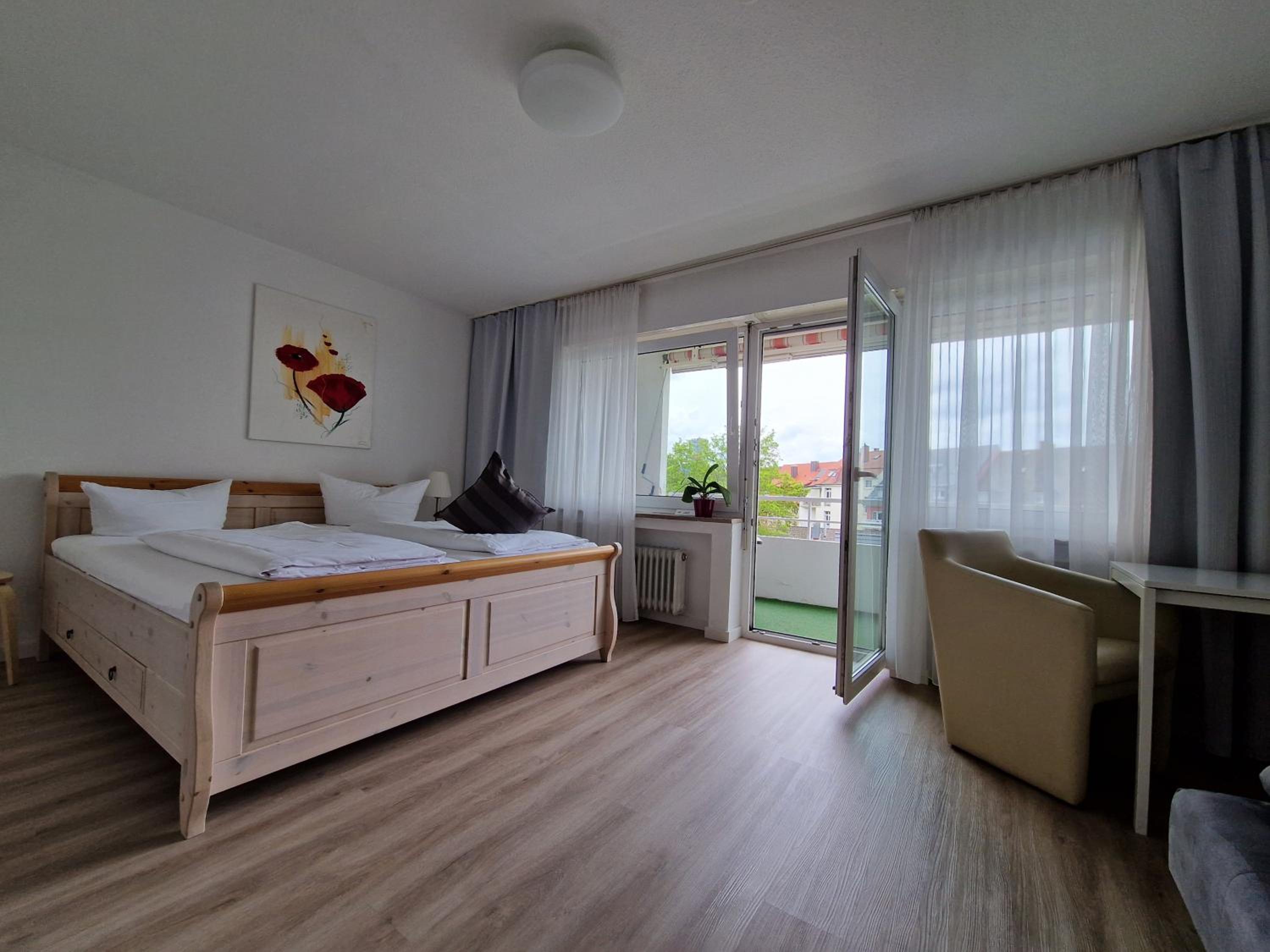 Double Room with Extra Bed and Balcony - Photo 13