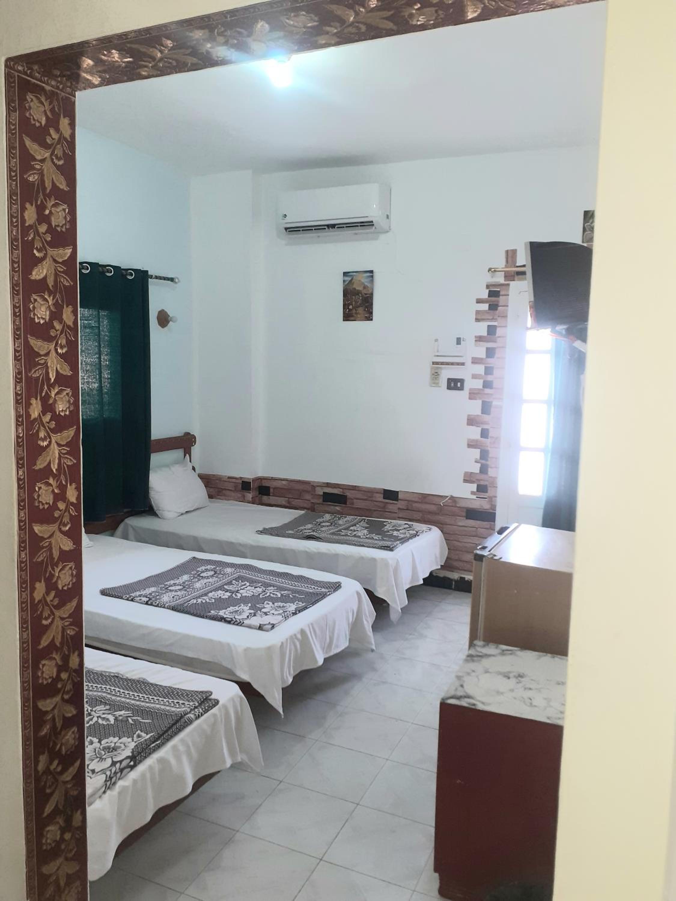 Triple Room with Private Bathroom - Photo 9