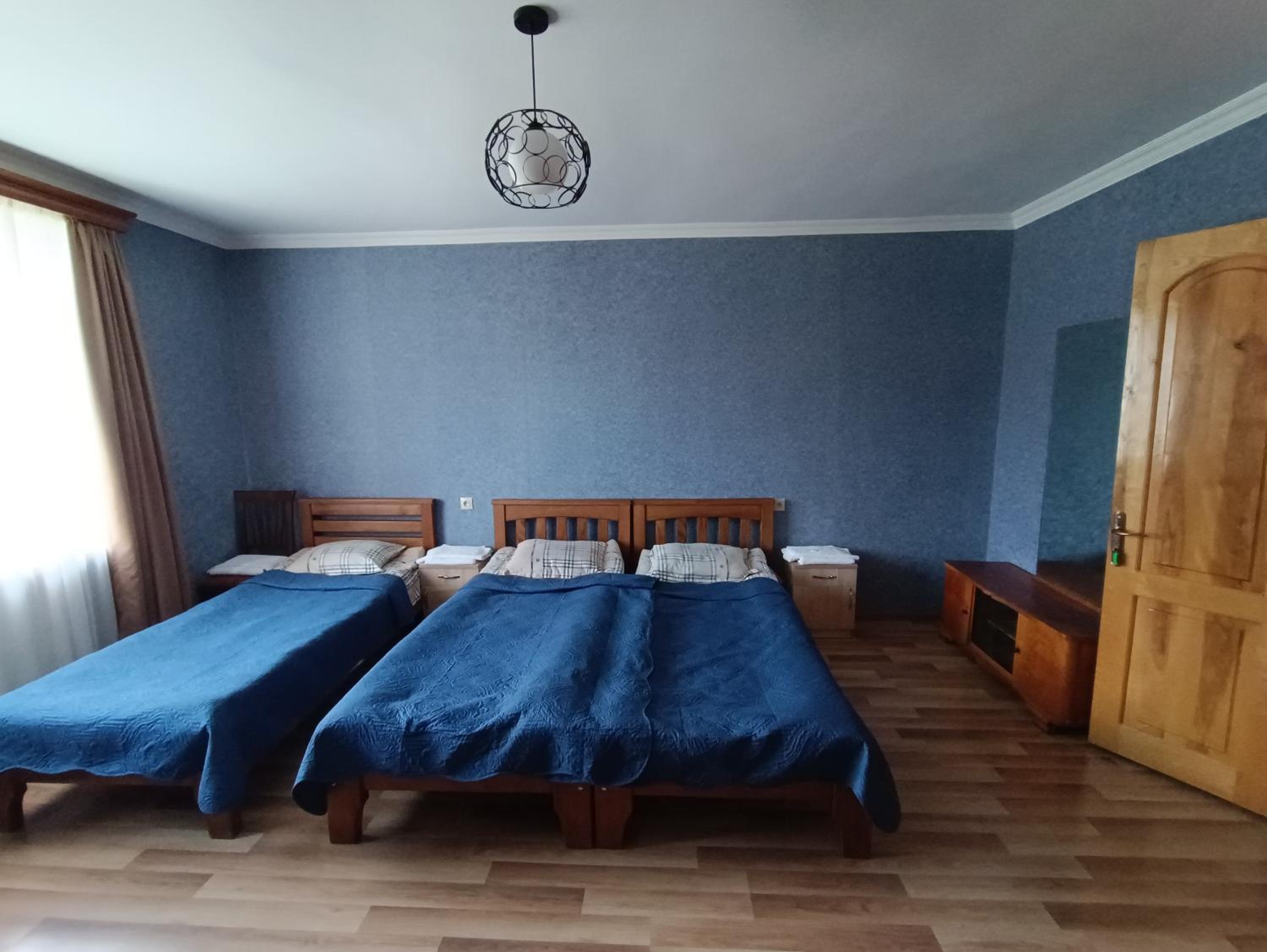 Quadruple Room with Private Bathroom