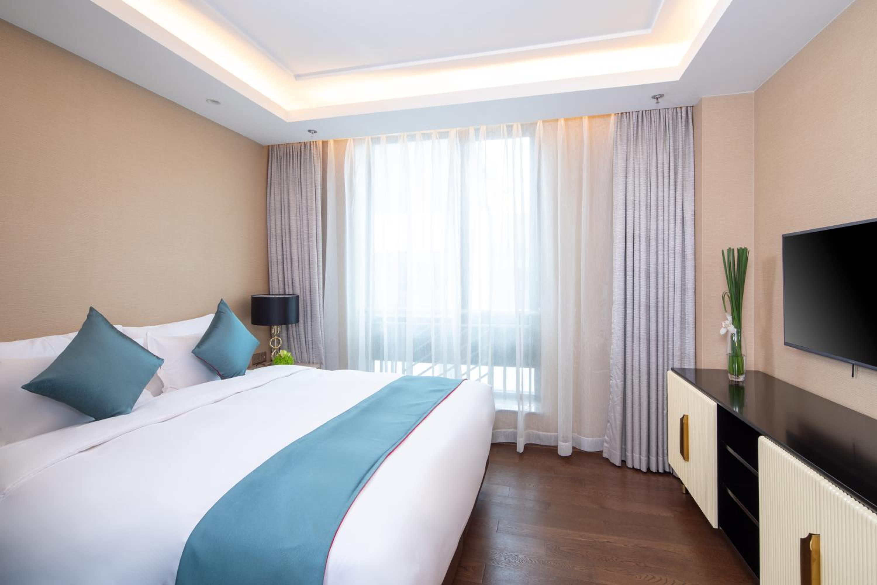 Three Bedroom Deluxe Room